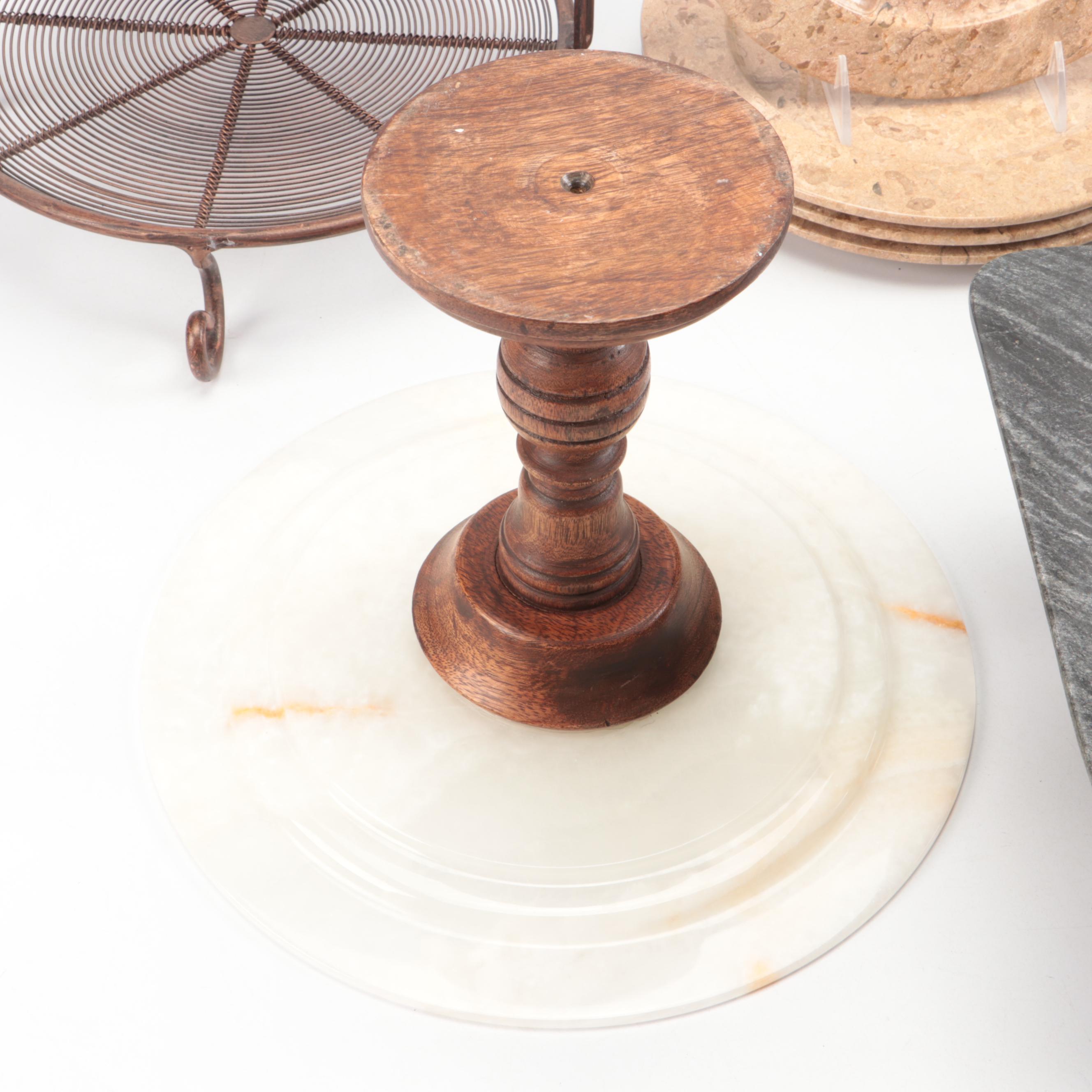 Fossils in Stone Carved Plates with Stone Bowls and Metal and Stone Stands