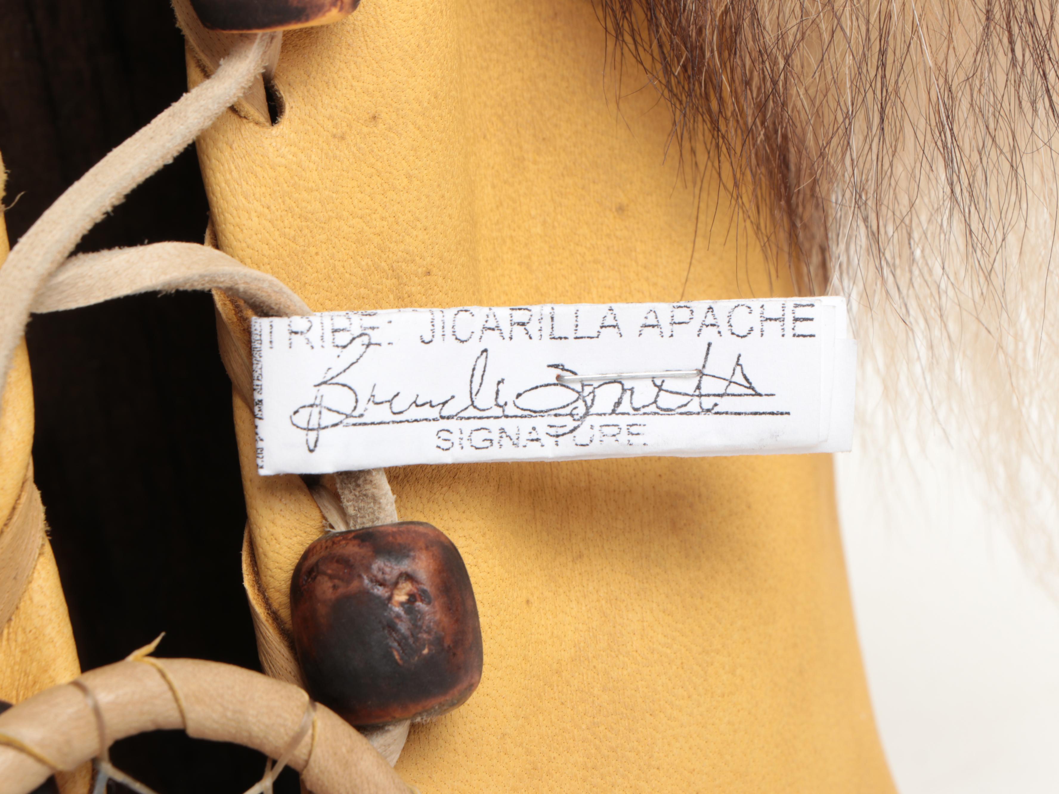 Jicarilla Apache Wood, Deer Hide, and Fox Fur Cradle Board with Feathers