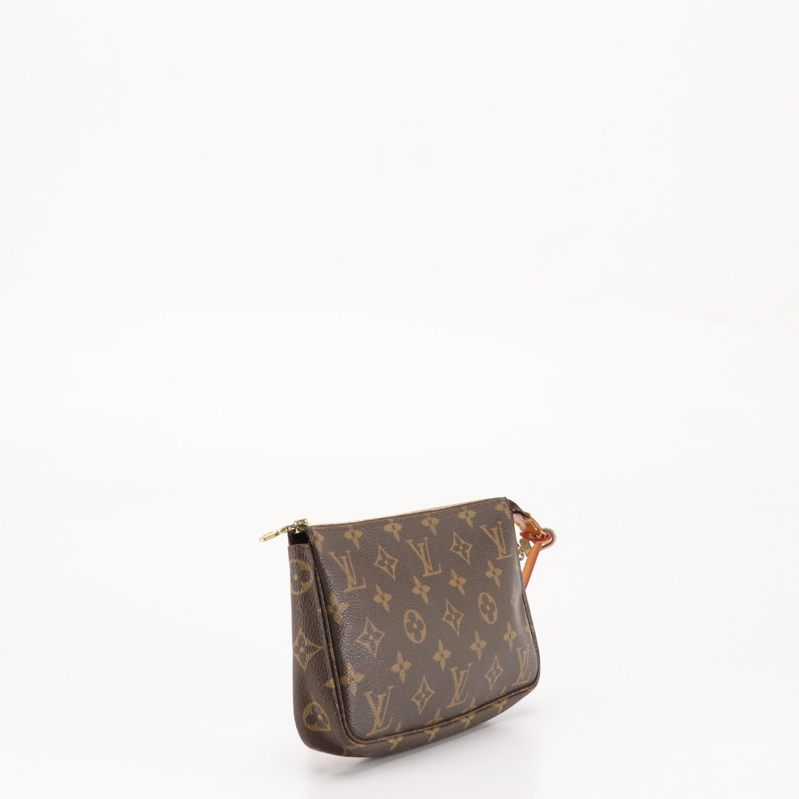 Louis Vuitton Zip Pochette Bag in Monogram Coated Canvas and Leather