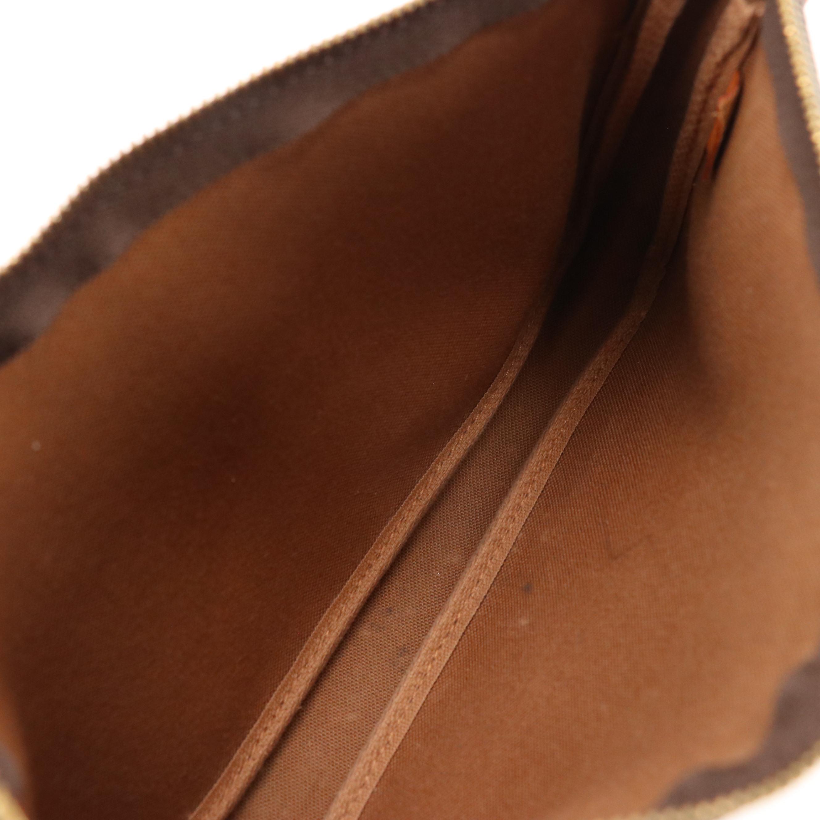 Louis Vuitton Zip Pochette Bag in Monogram Coated Canvas and Leather