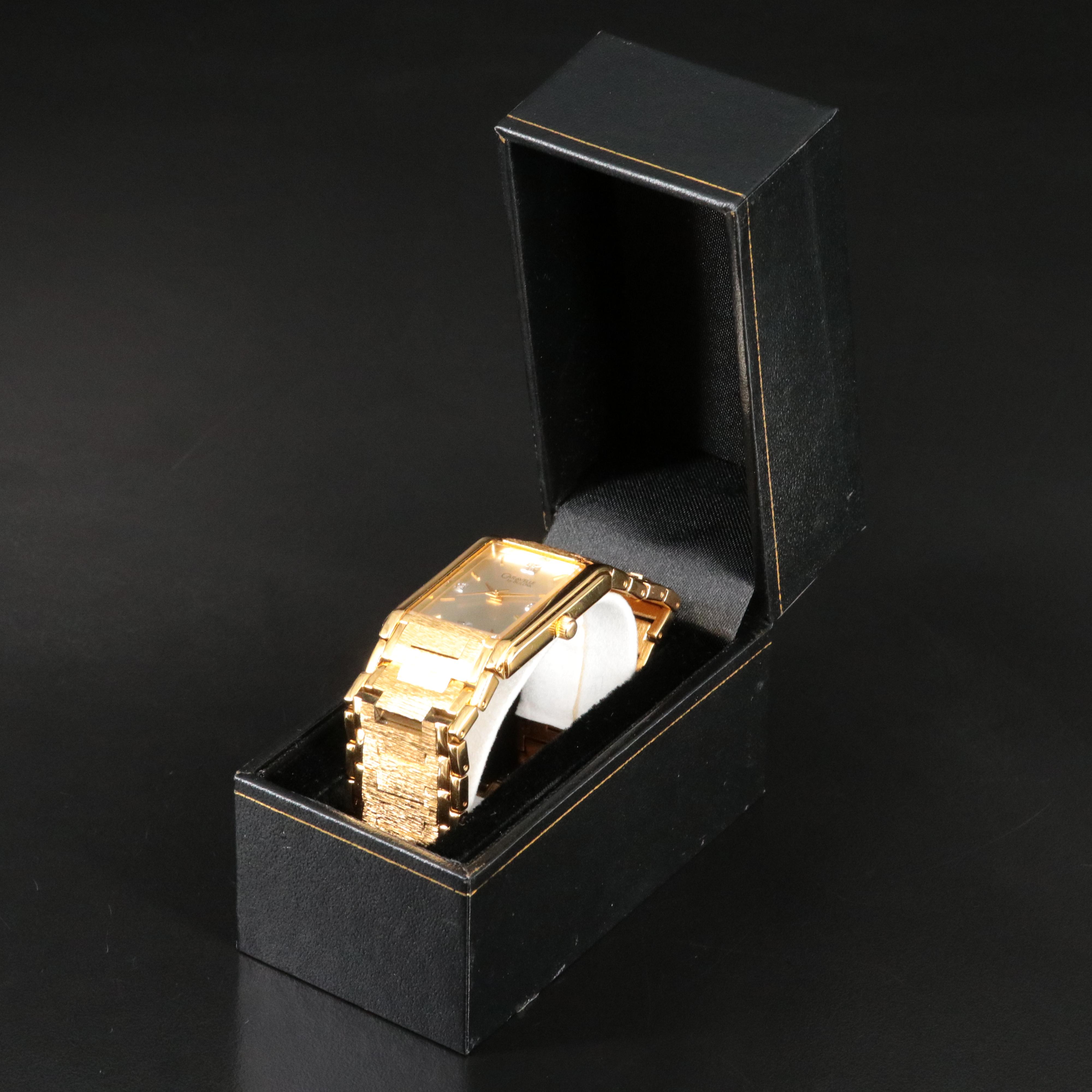 Caravelle by Bulova Diamond Dial Gold-Tone Watch