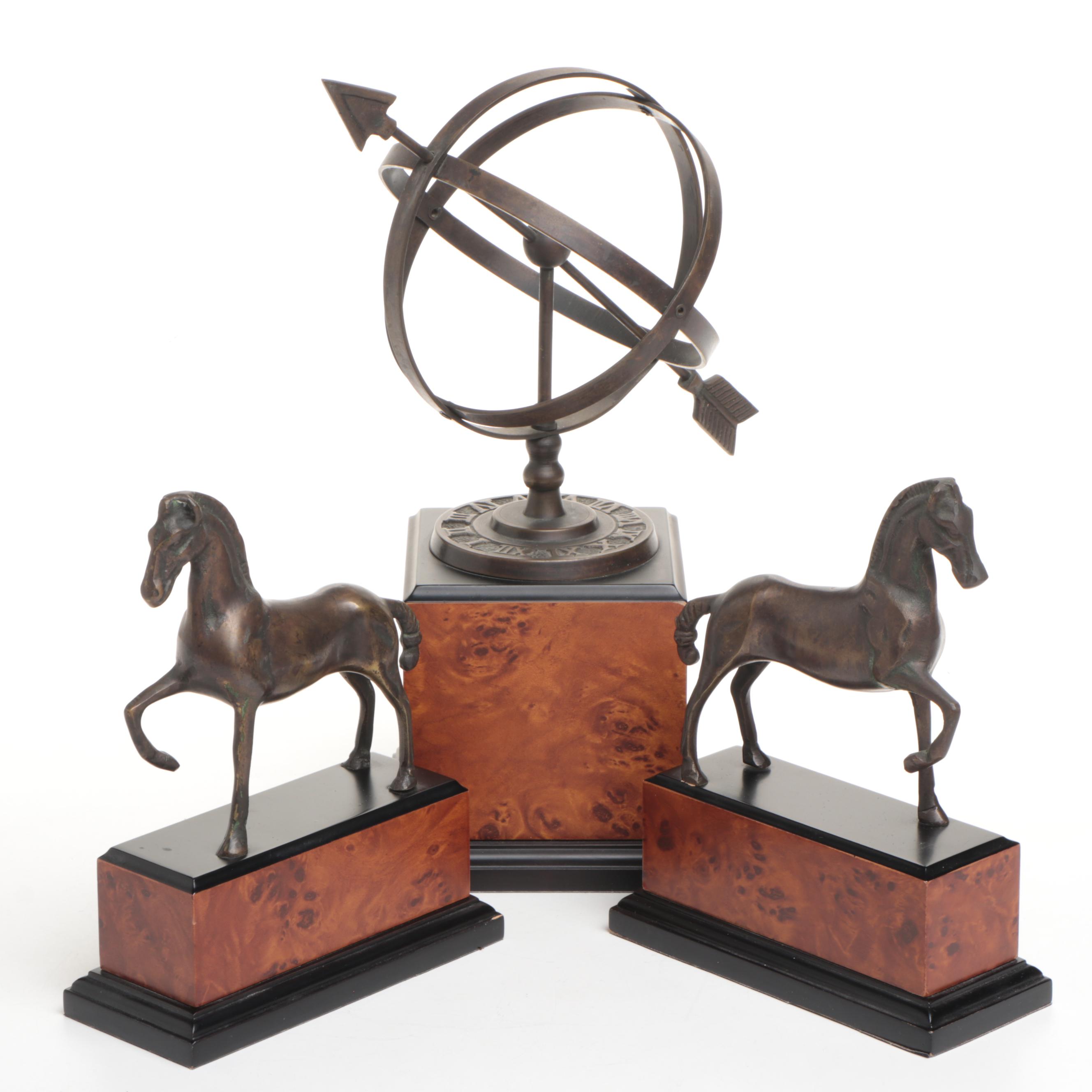 Pair of Bronzed Horse Bookends with Armillary Sphere on Faux Bois Stands