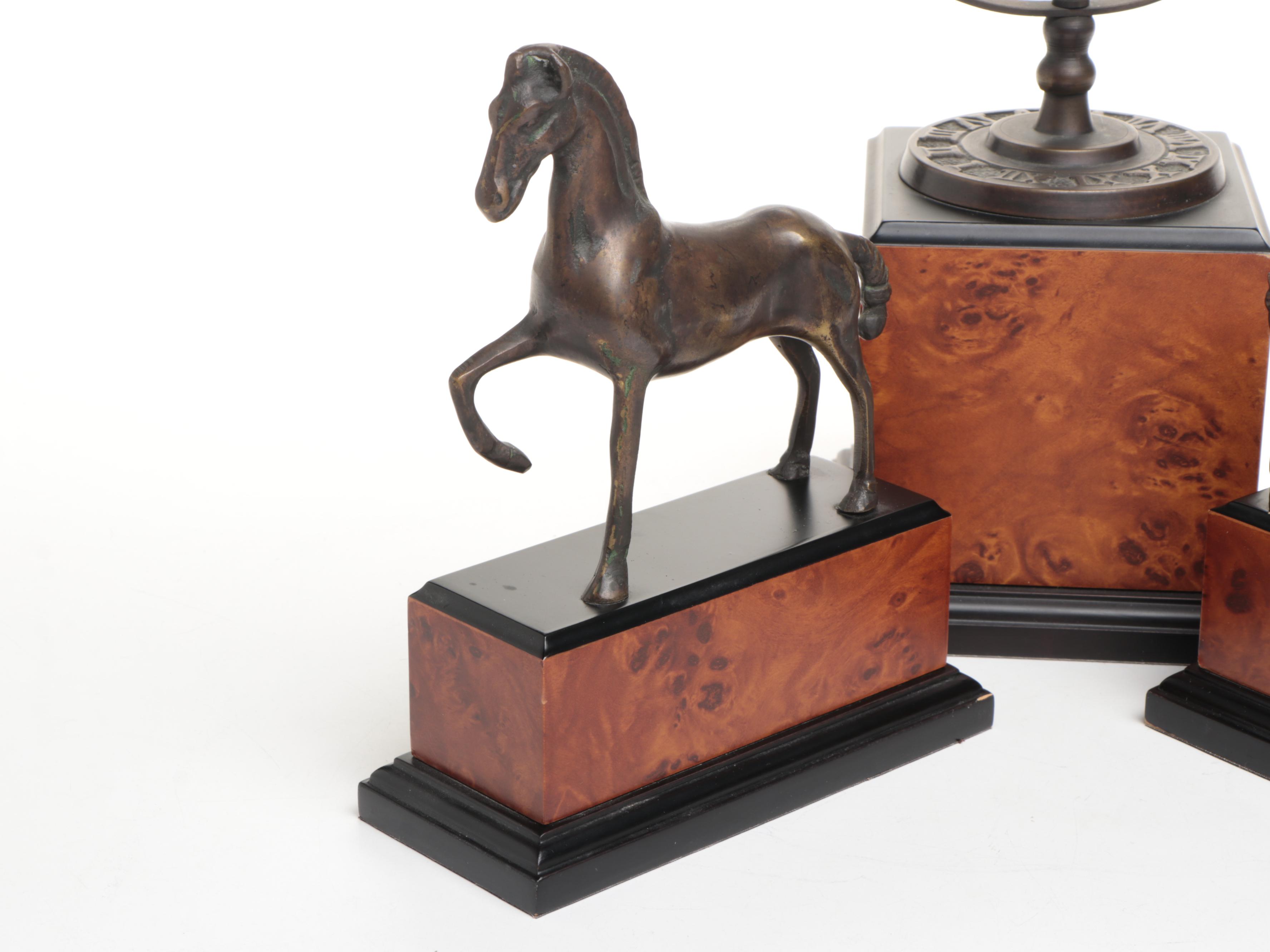 Pair of Bronzed Horse Bookends with Armillary Sphere on Faux Bois Stands