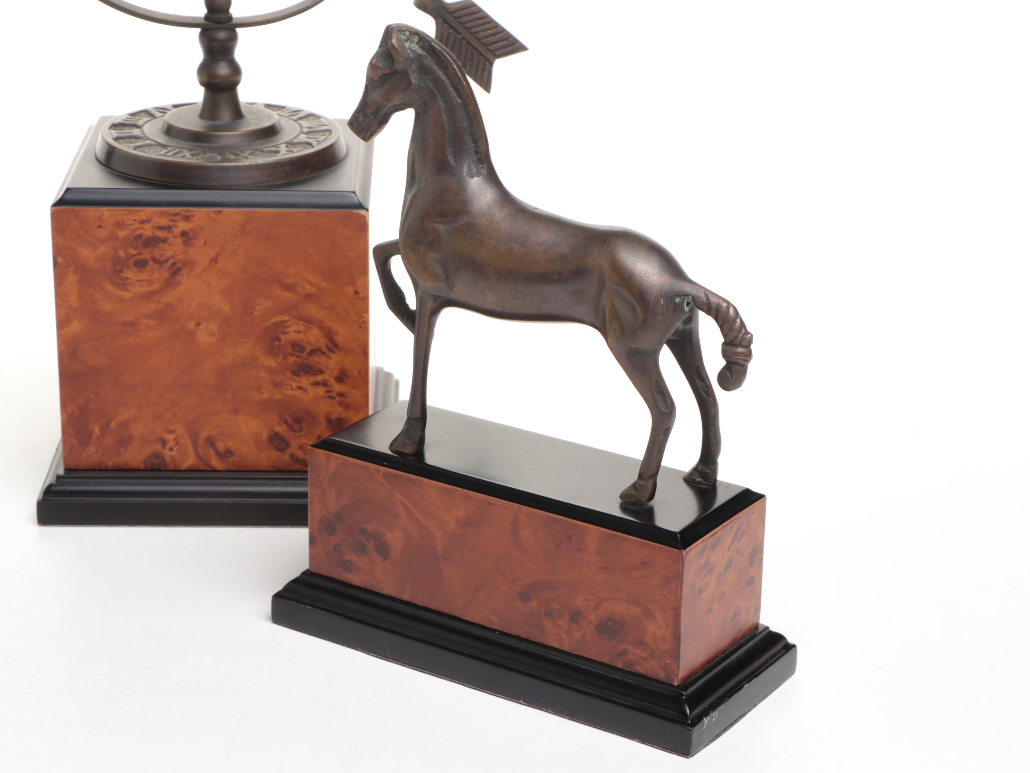 Pair of Bronzed Horse Bookends with Armillary Sphere on Faux Bois Stands