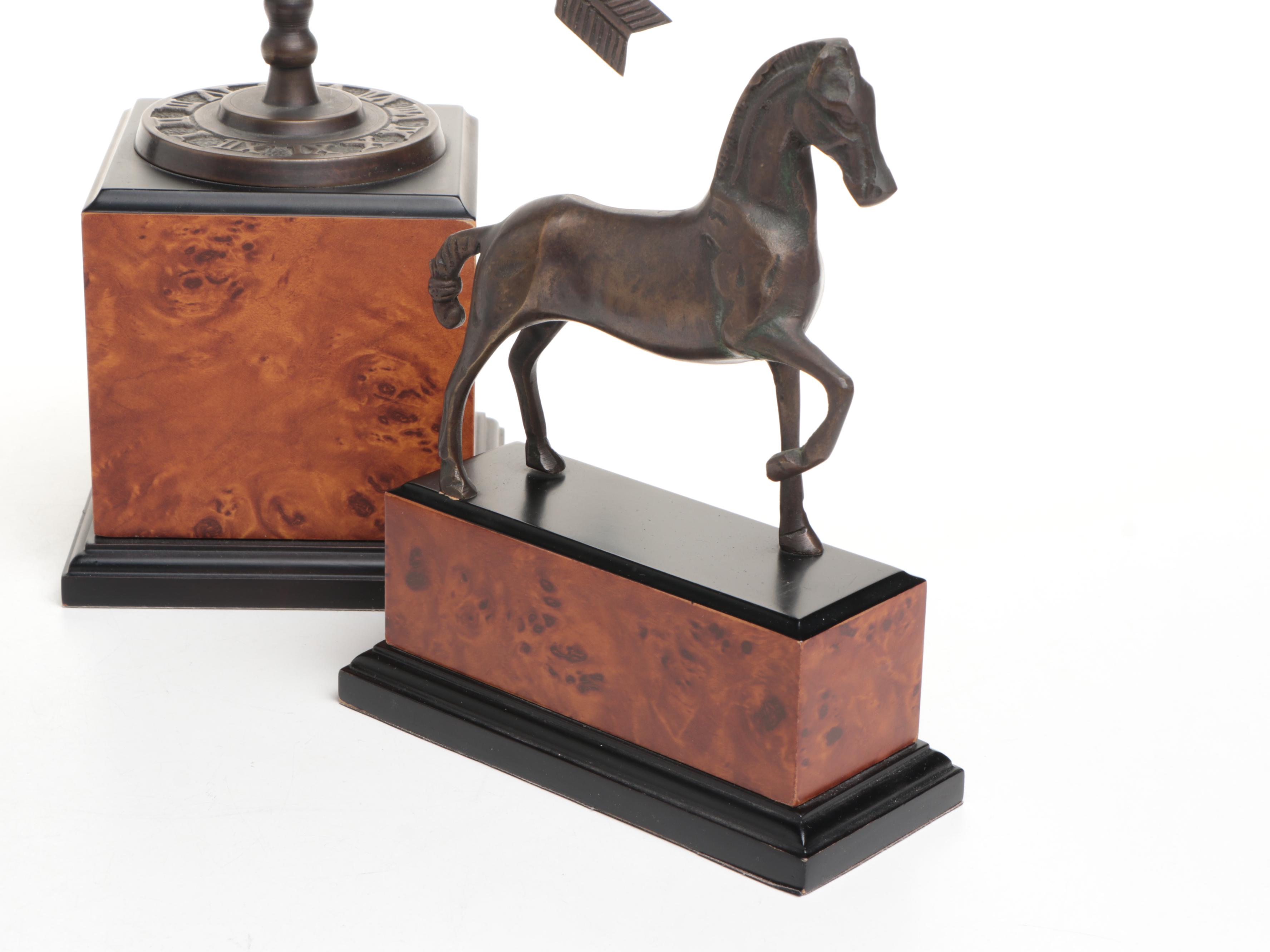 Pair of Bronzed Horse Bookends with Armillary Sphere on Faux Bois Stands