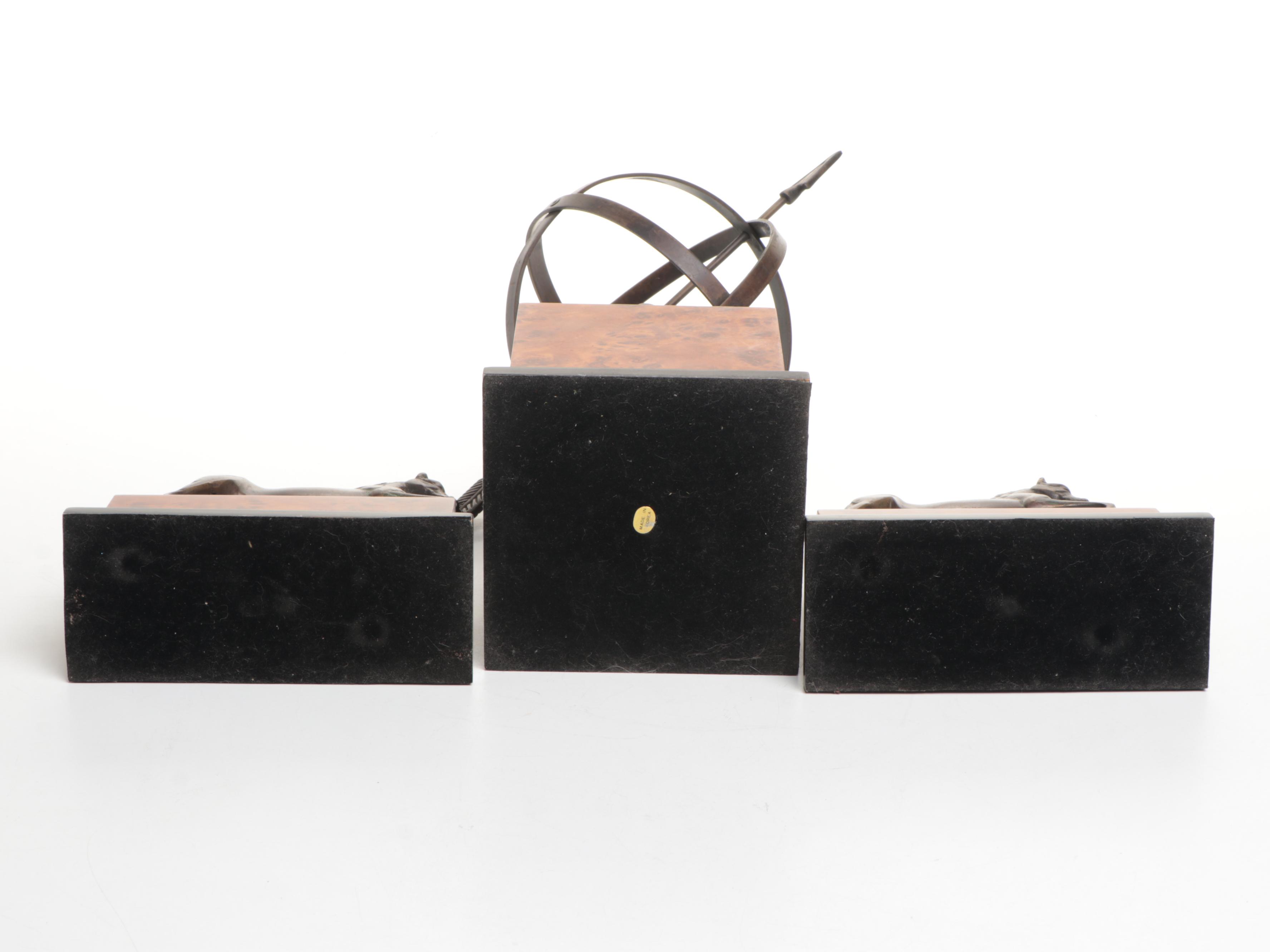 Pair of Bronzed Horse Bookends with Armillary Sphere on Faux Bois Stands