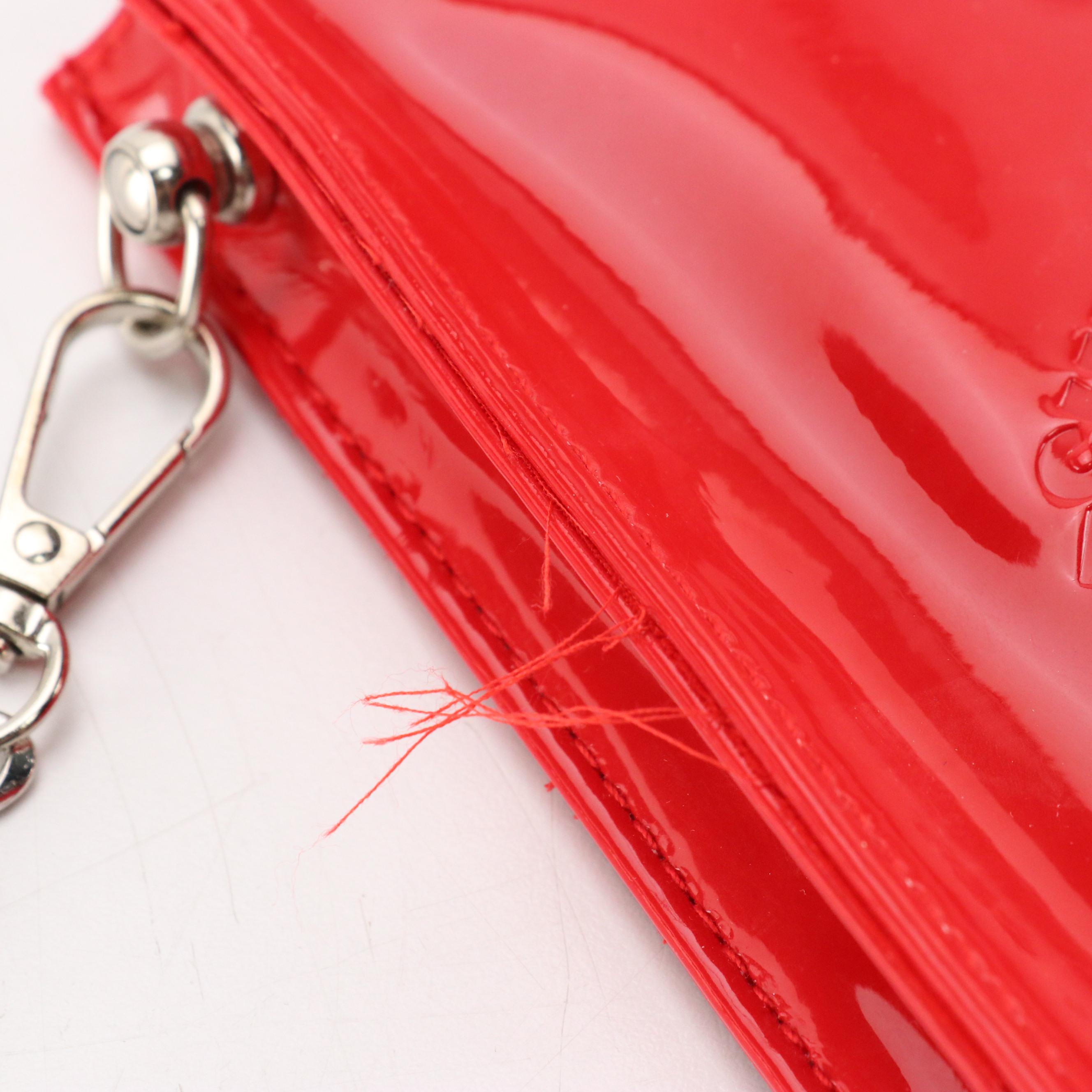 Christian Louboutin Zip Pouch Crossbody Bag in Red Faux-Patent Leather