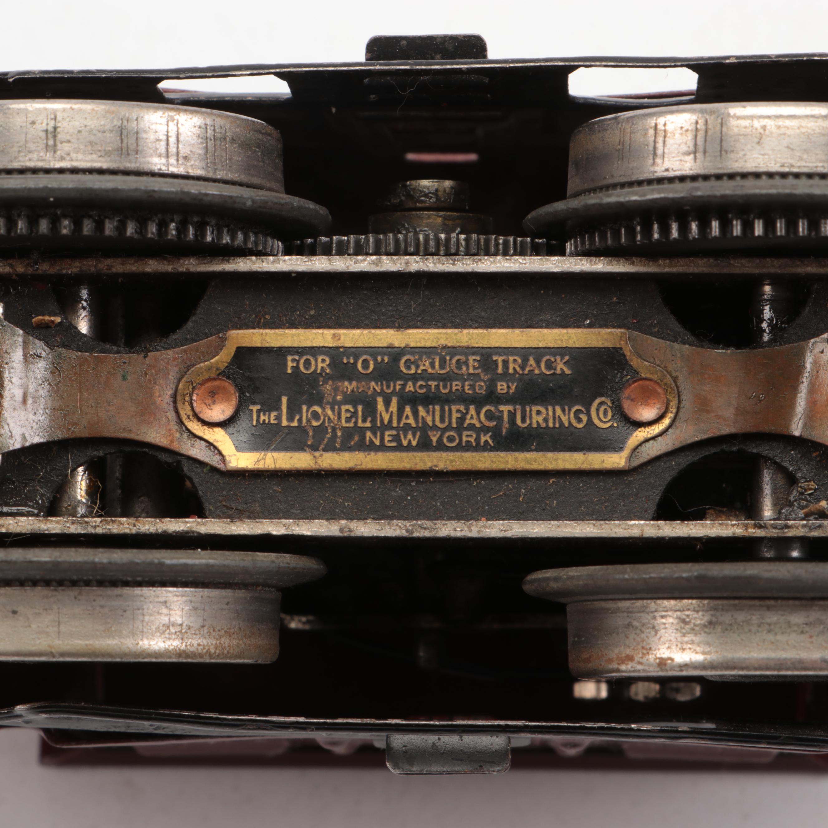 Lionel "O" Gauge with Other Train Cars and Donald Duck Conductor Figurine