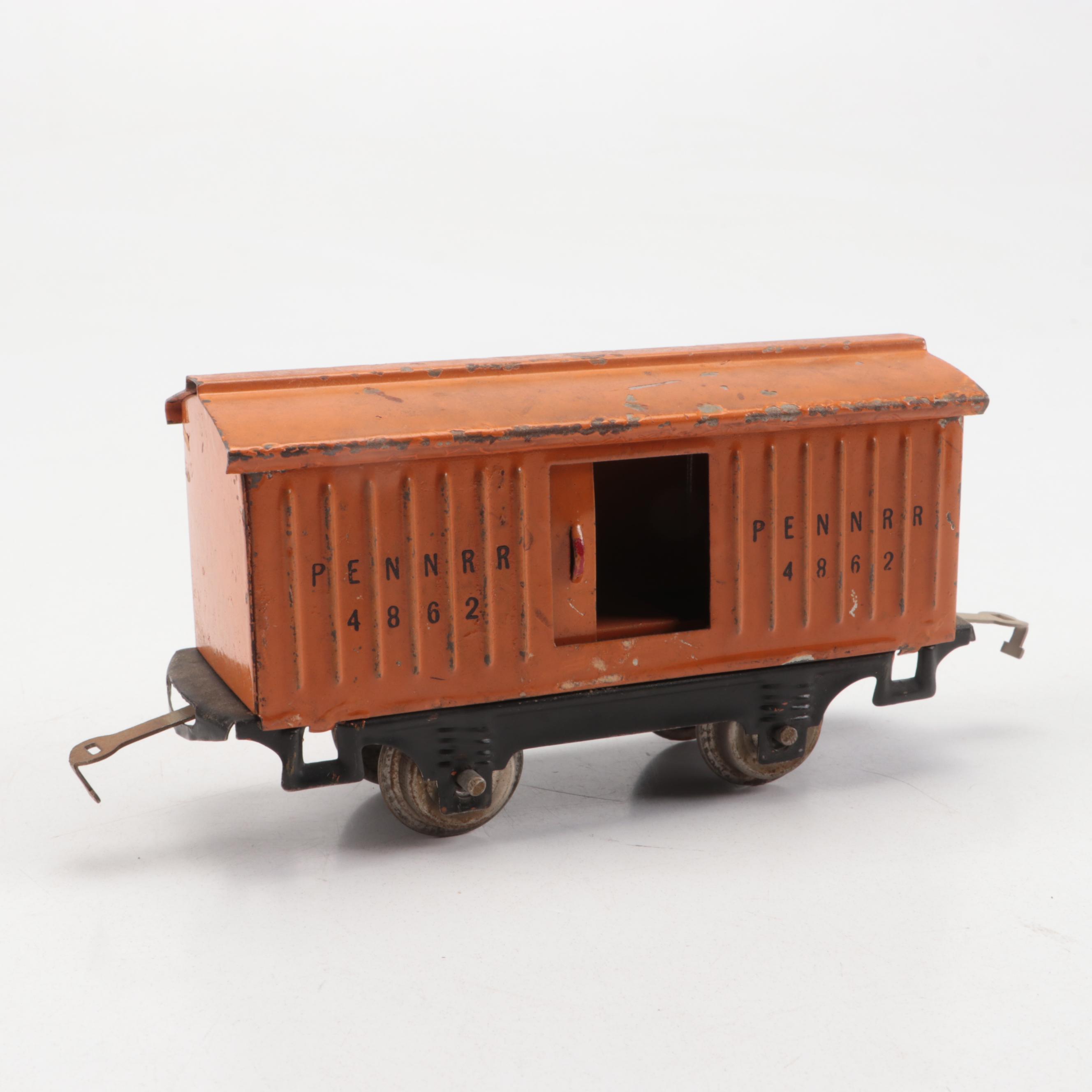 Lionel "O" Gauge with Other Train Cars and Donald Duck Conductor Figurine