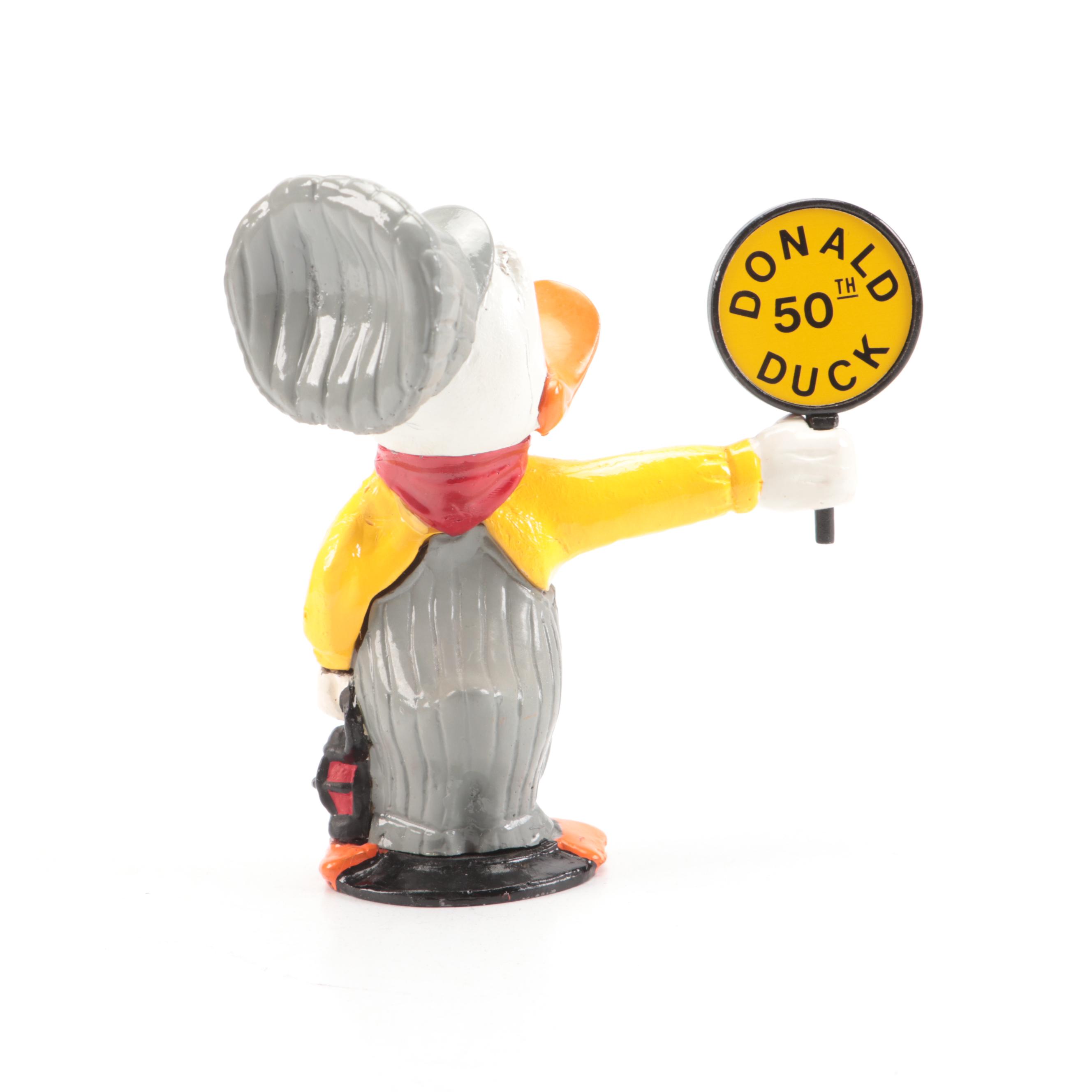 Lionel "O" Gauge with Other Train Cars and Donald Duck Conductor Figurine