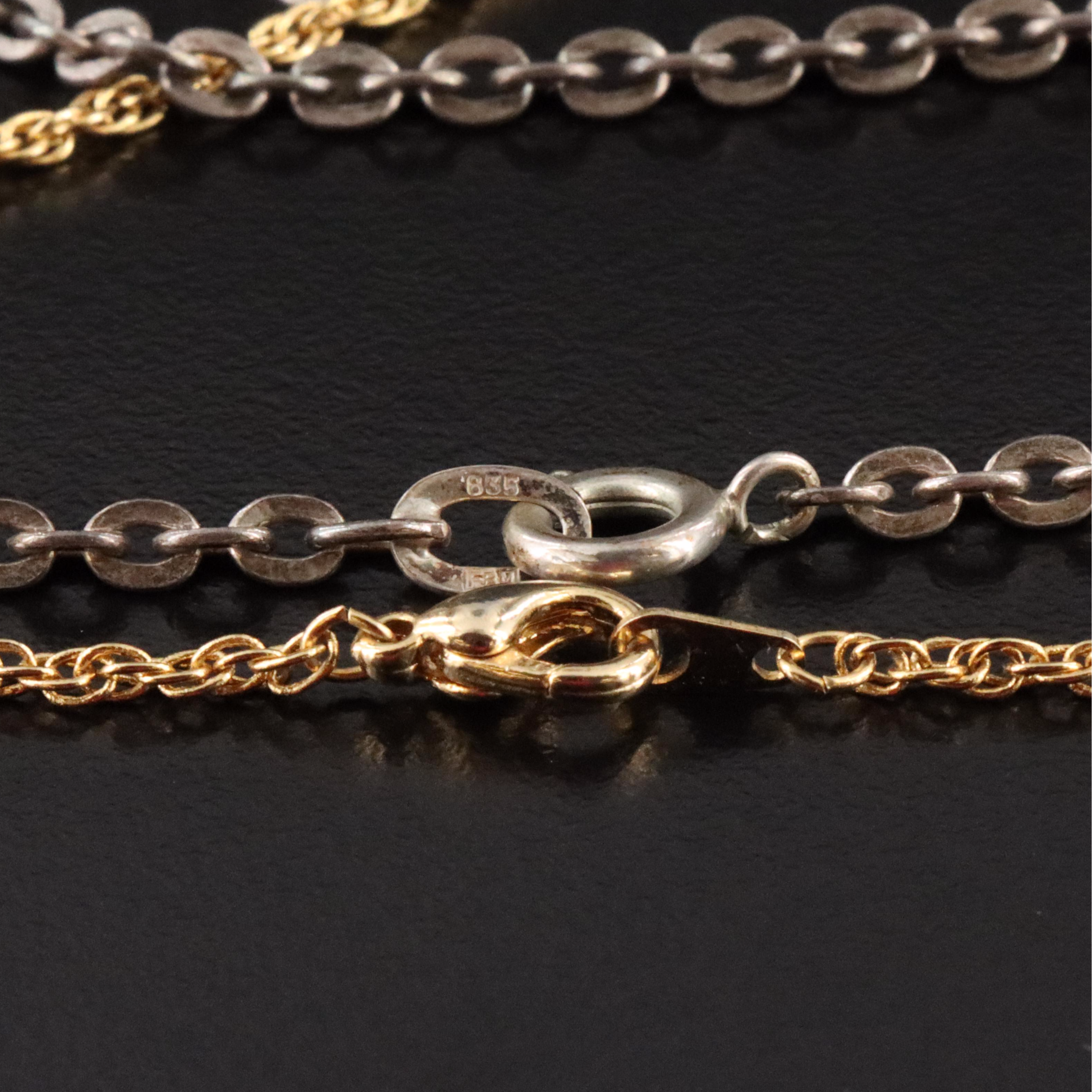 Sterling, 1942 Walking Liberty Coin and Coburg Medallion Featured in Necklaces