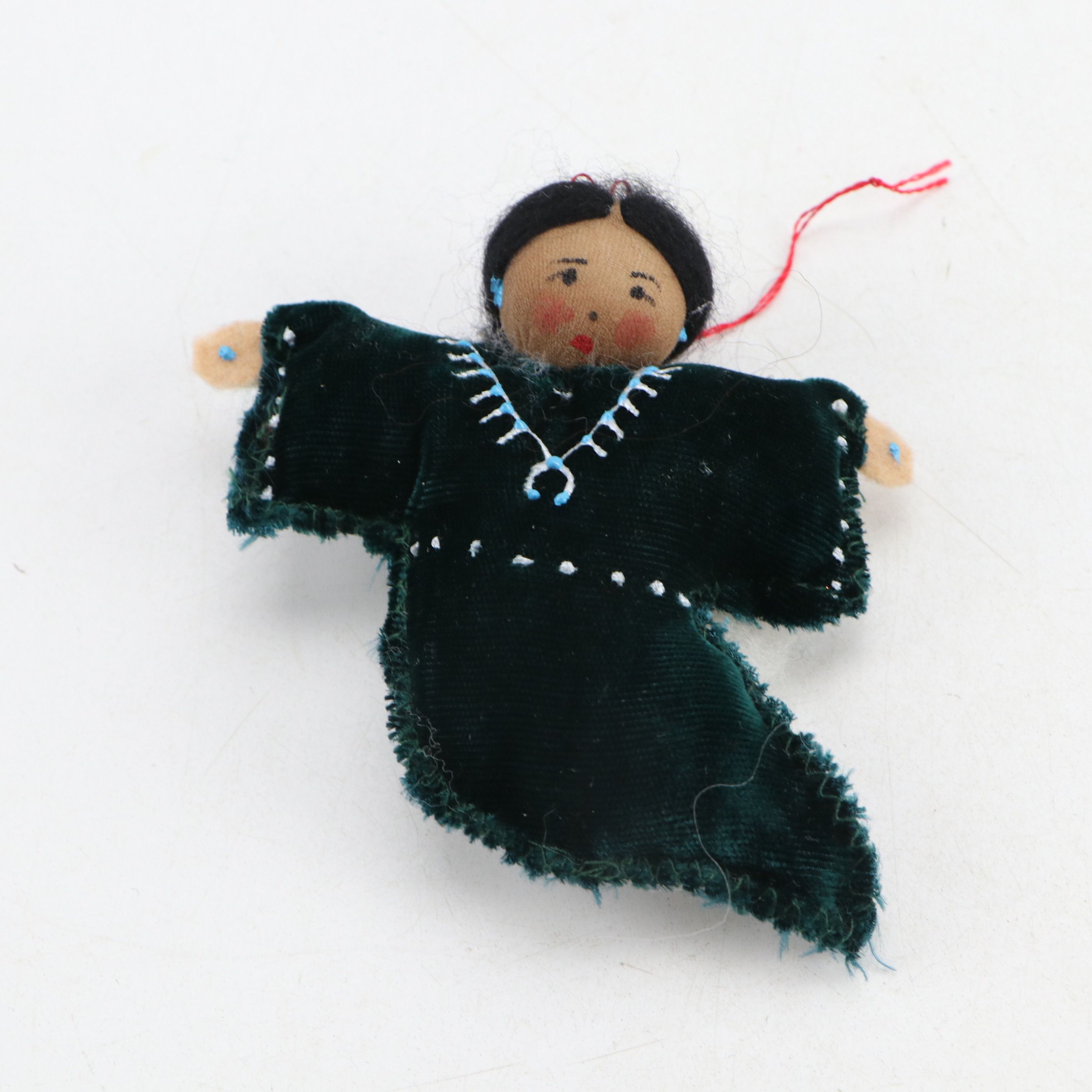 Handmade Navajo Storyteller Doll with Other Indigenous Dolls and Figures