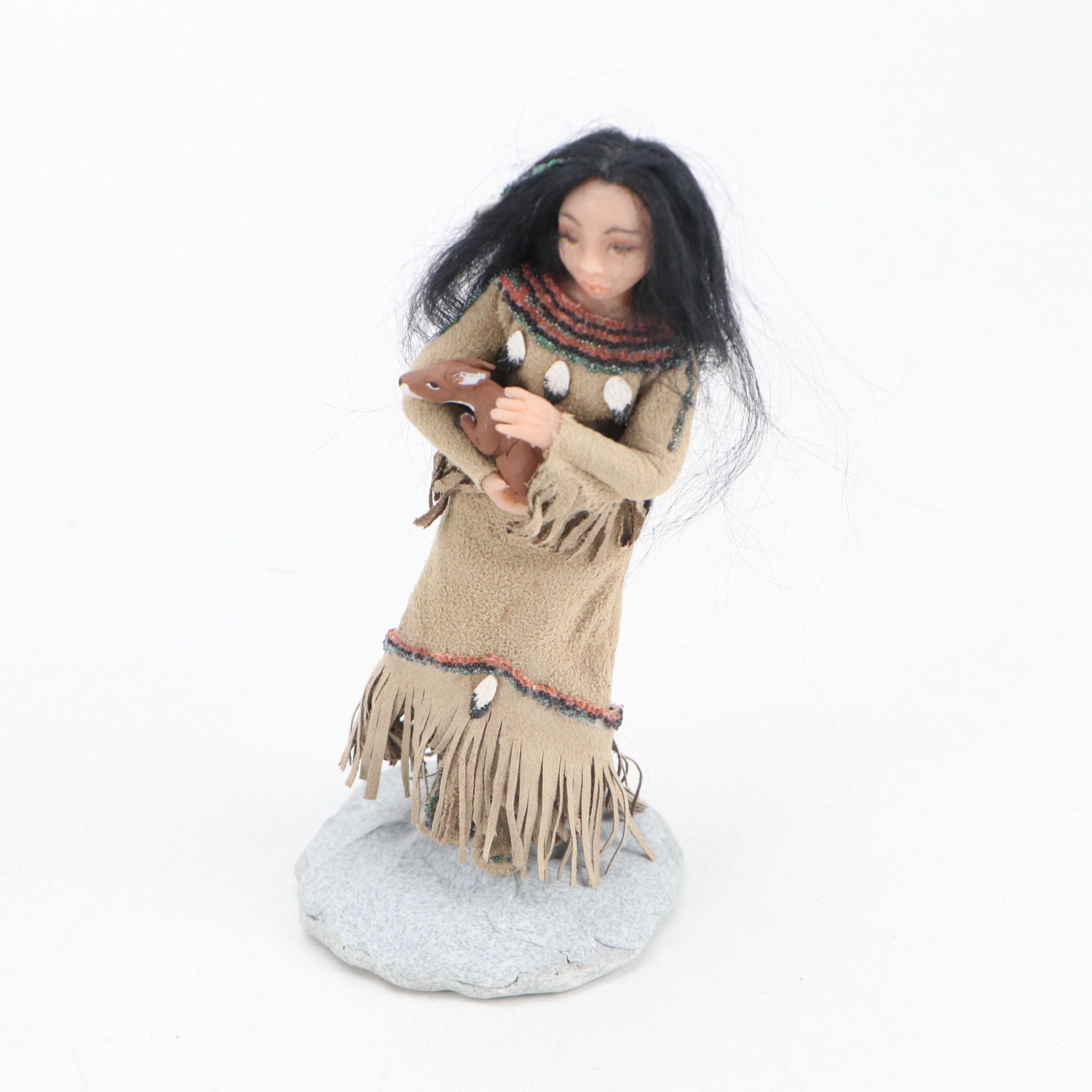 Handmade Navajo Storyteller Doll with Other Indigenous Dolls and Figures