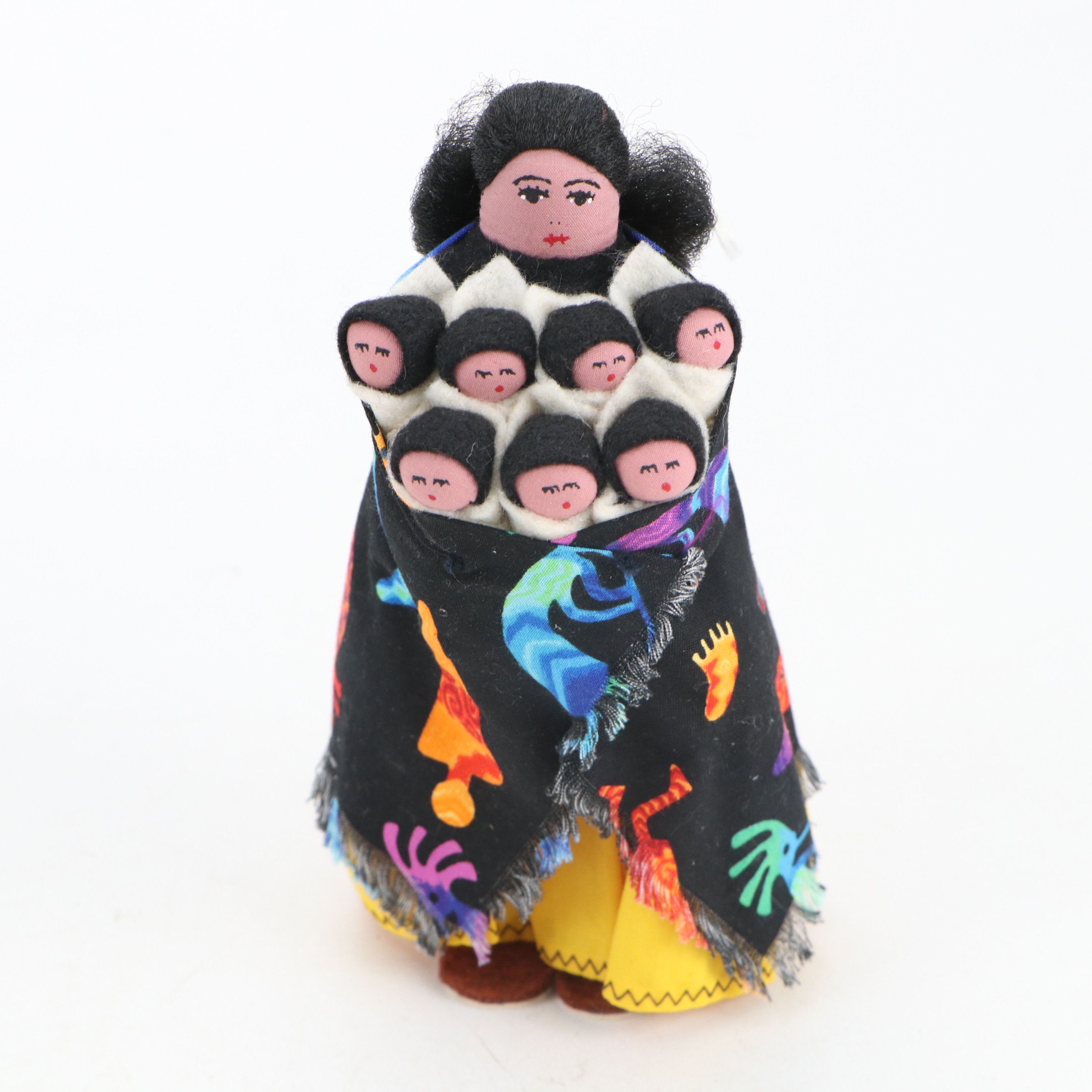 Handmade Navajo Storyteller Doll with Other Indigenous Dolls and Figures