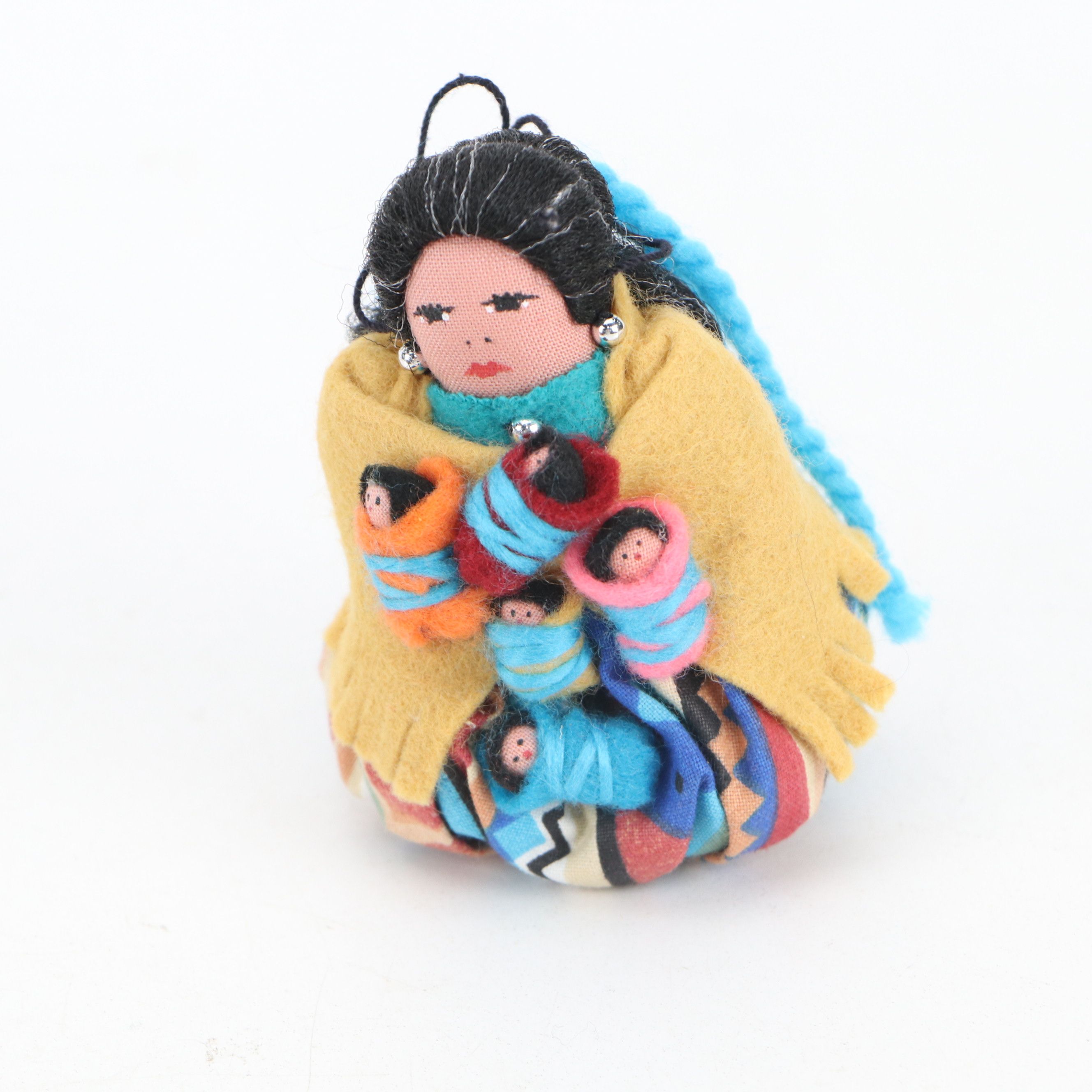 Handmade Navajo Storyteller Doll with Other Indigenous Dolls and Figures