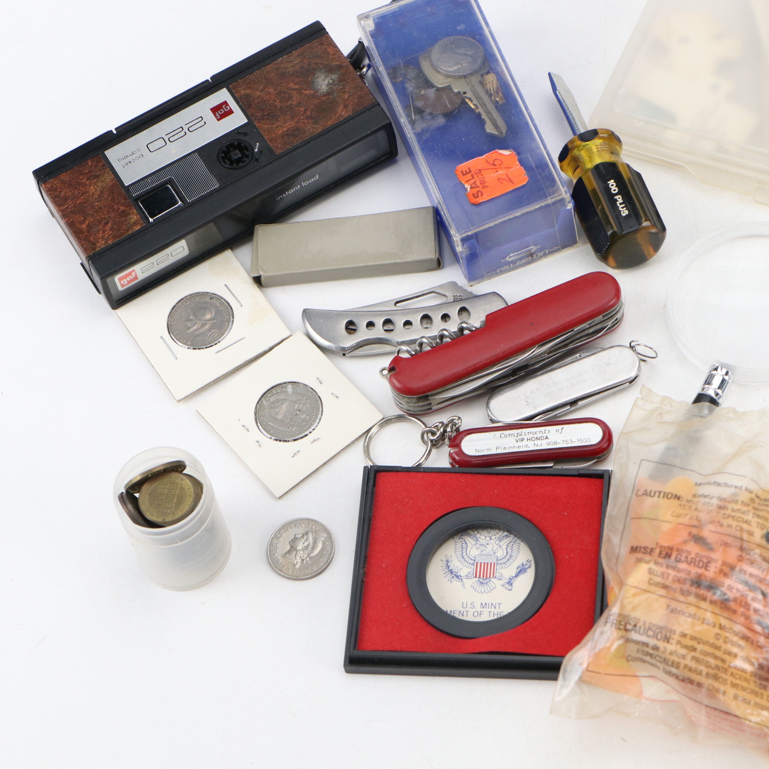 Pocket Knives, Travel Tokens, Camera, Clock, and More Memorabilia