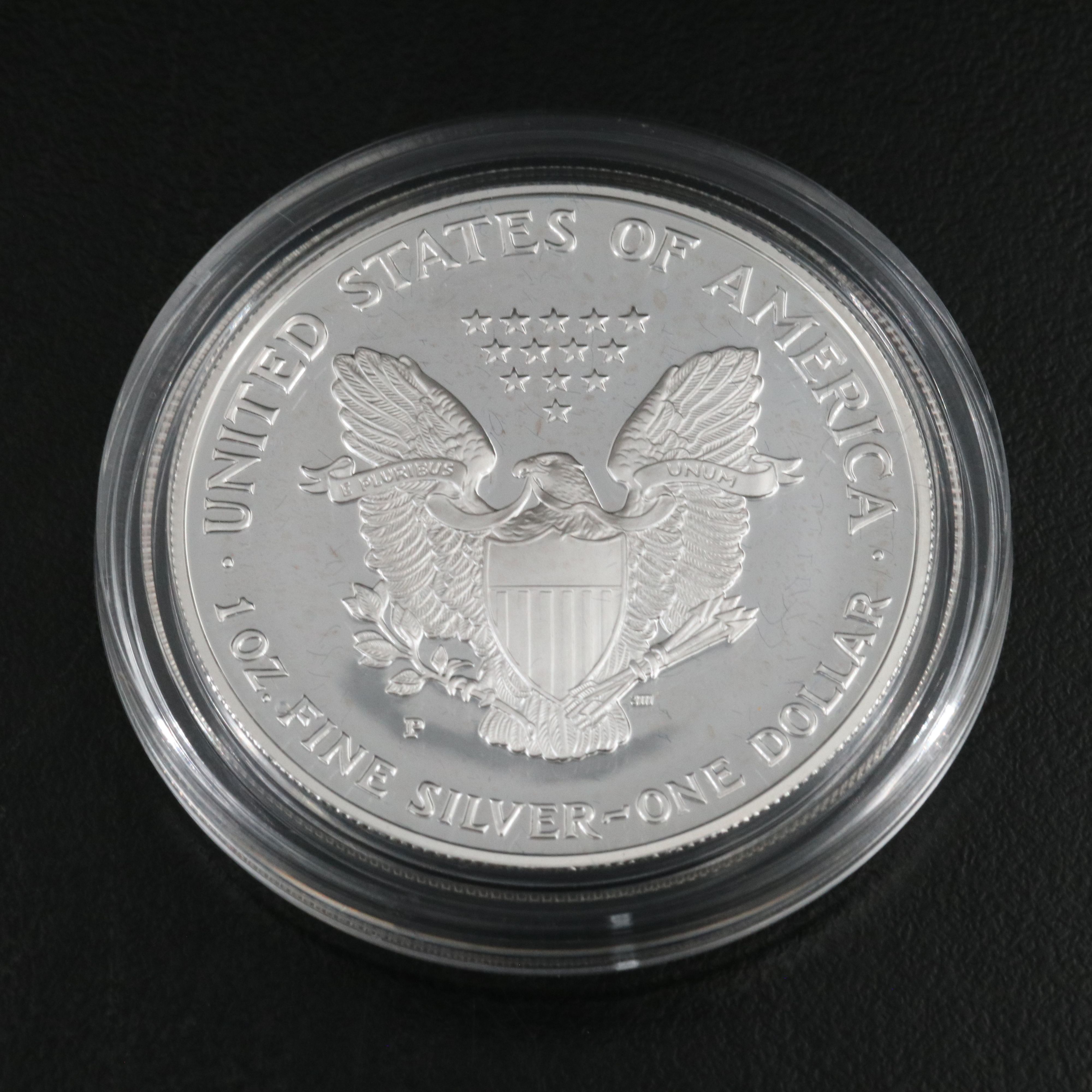 Three United States Proof Silver Eagles 2000, 2003, and 2008