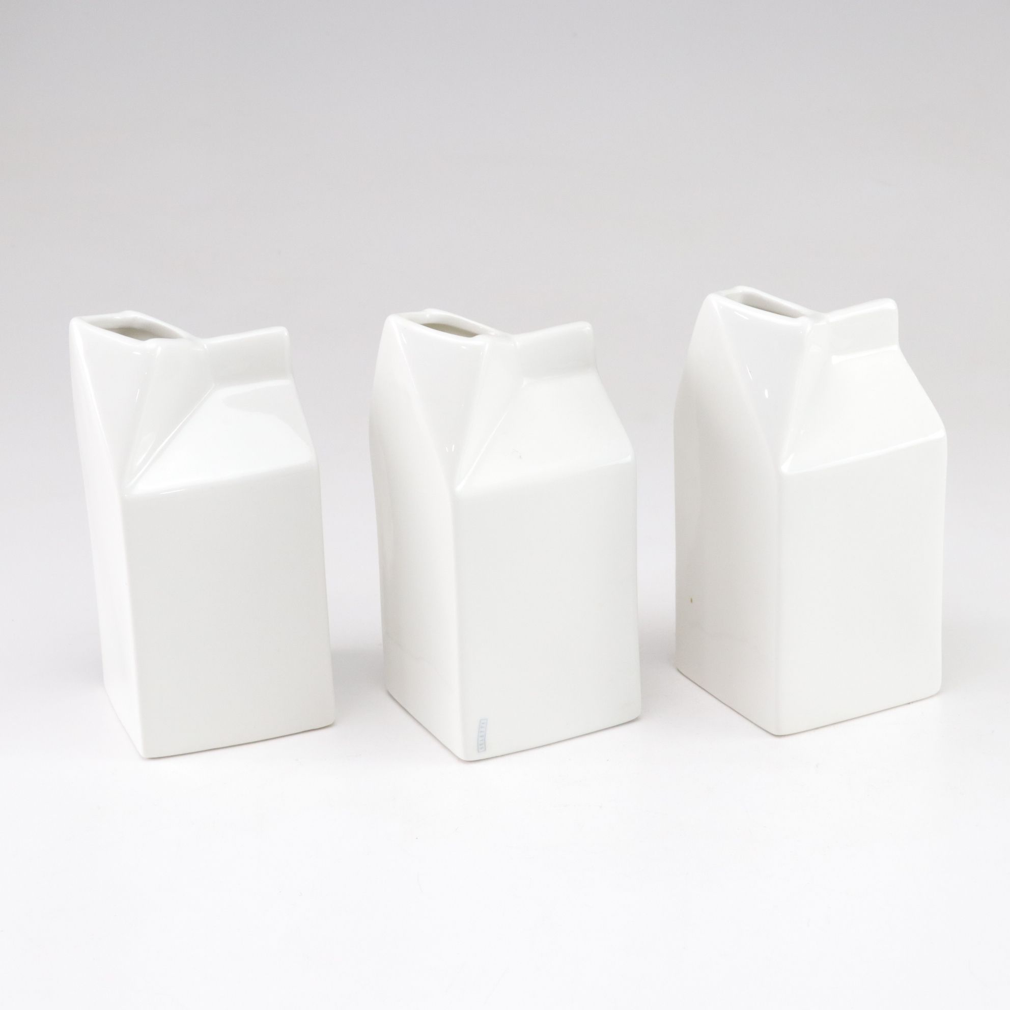 Seletti Ceramic Milk Carton Creamers with Giraffe Patterned Salad Servers
