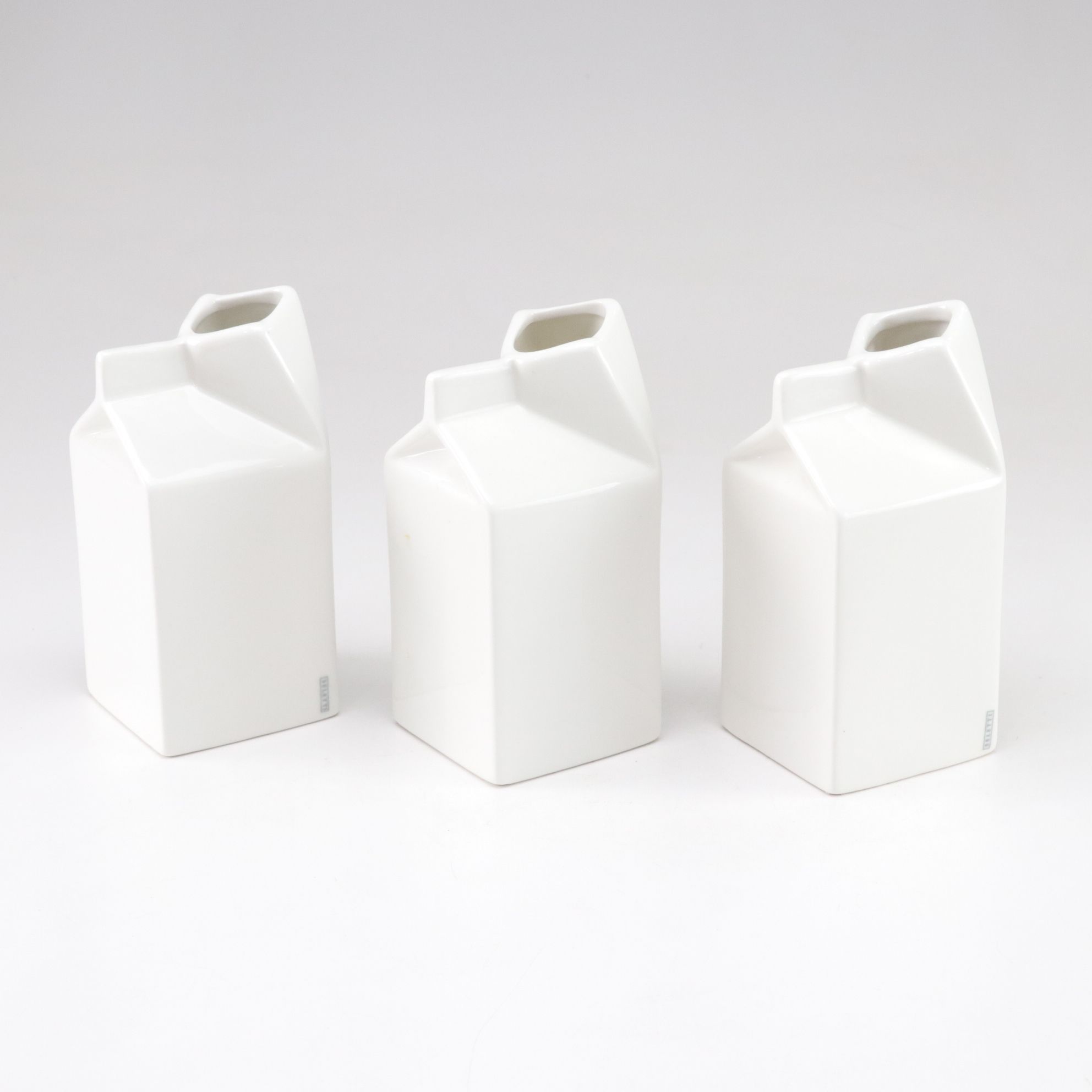 Seletti Ceramic Milk Carton Creamers with Giraffe Patterned Salad Servers