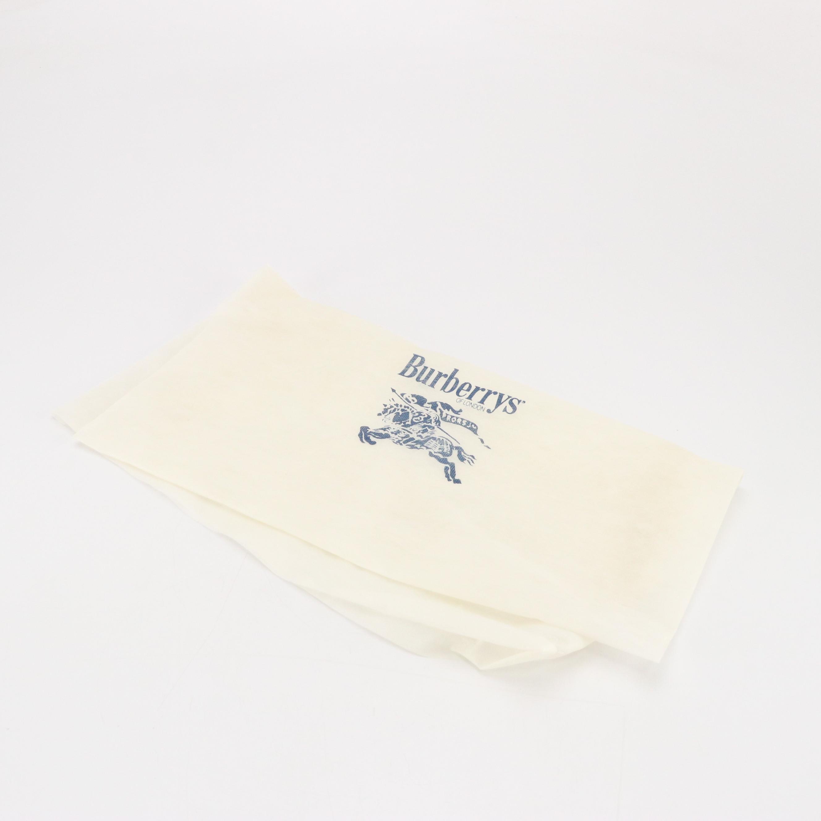 Burberrys Front Flap Pocket Wristelt Clutch in Brown Grained Leather