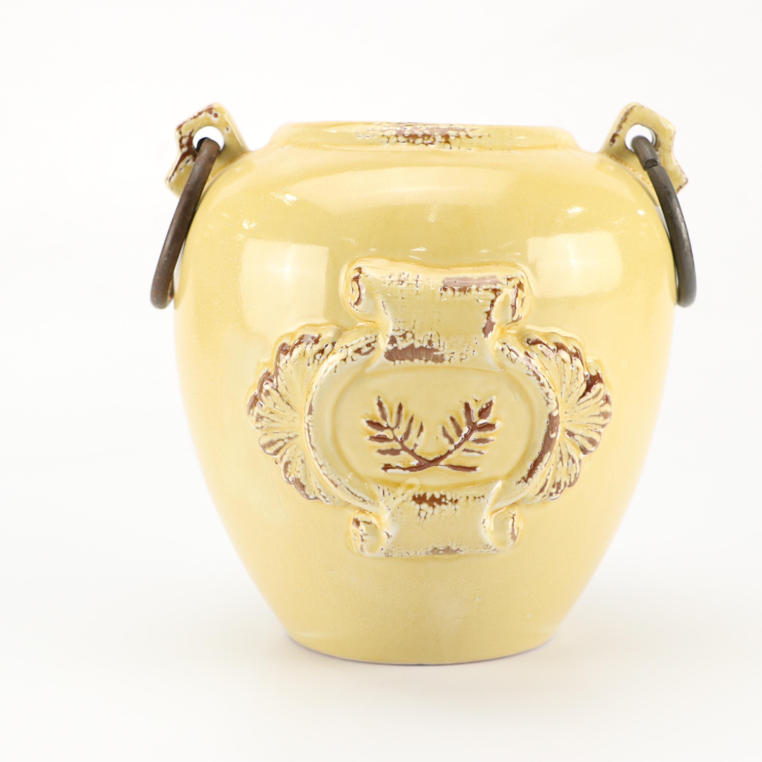 Art Nouveau Style Scrolled Wrought Iron Votive Holders with Yellow Ceramic Vase