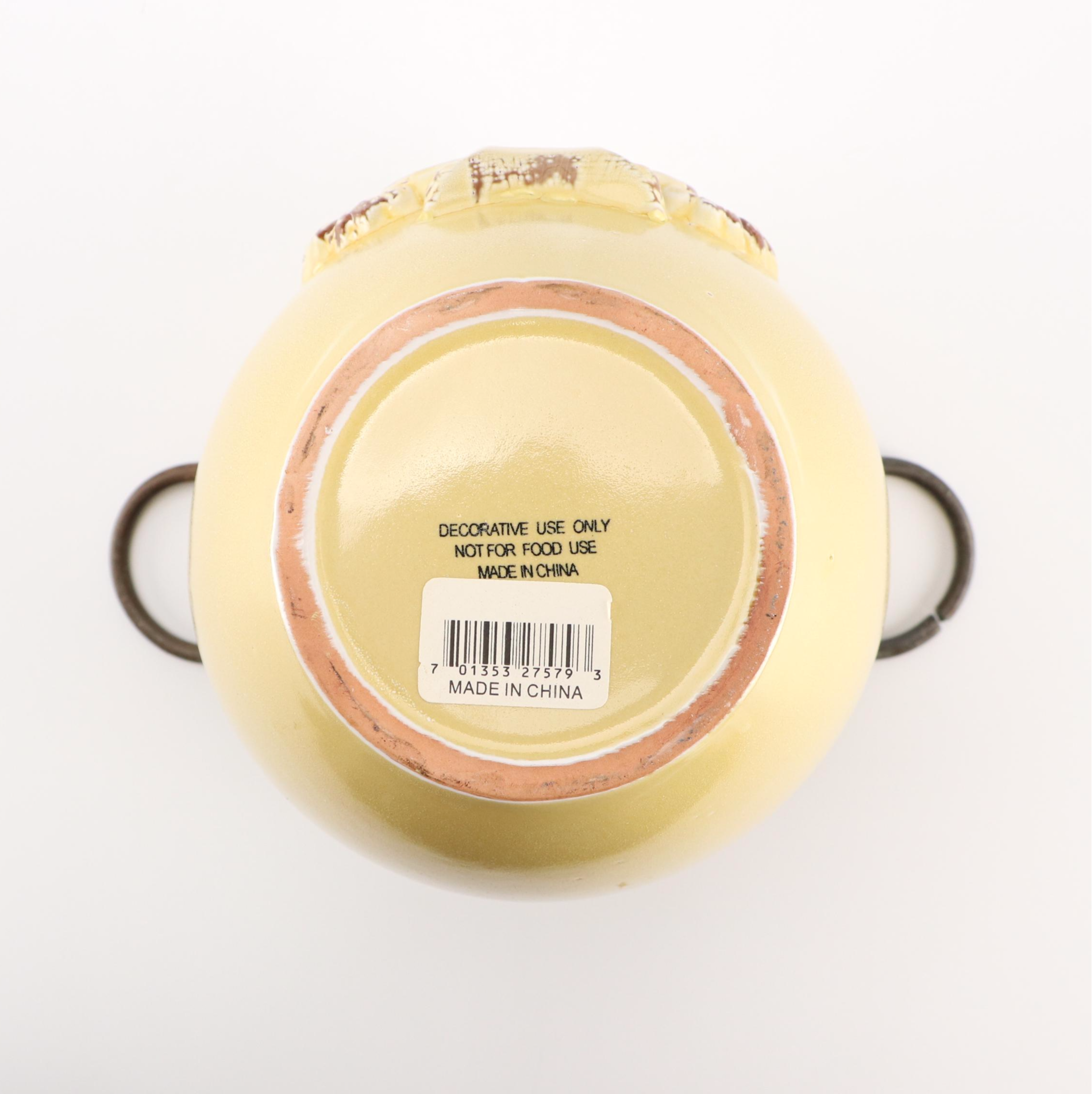 Art Nouveau Style Scrolled Wrought Iron Votive Holders with Yellow Ceramic Vase