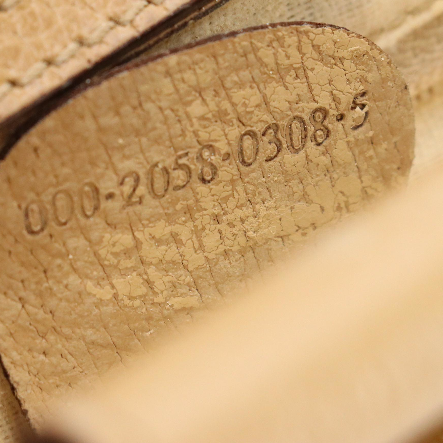 Gucci Front Pocket Metal Ring Handbag in Brown Leather