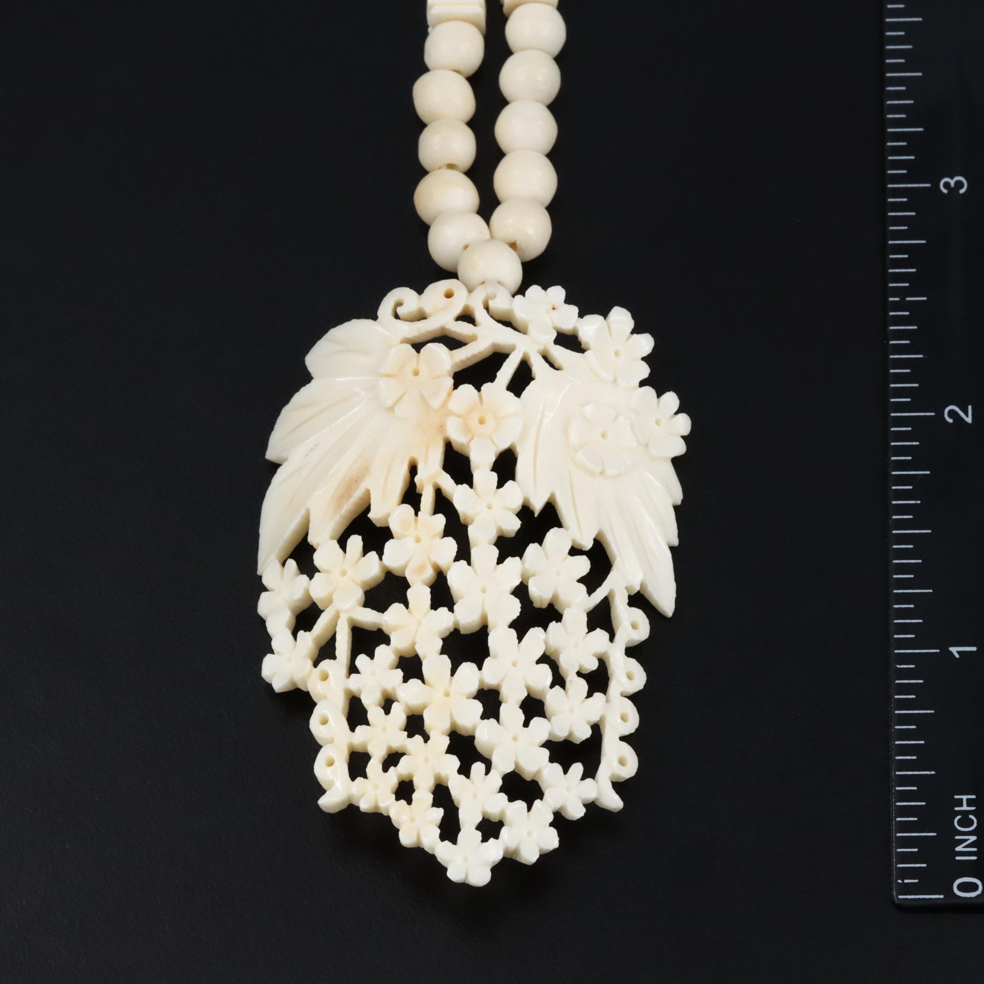 Carved Bone Floral Necklace and Earrings Set
