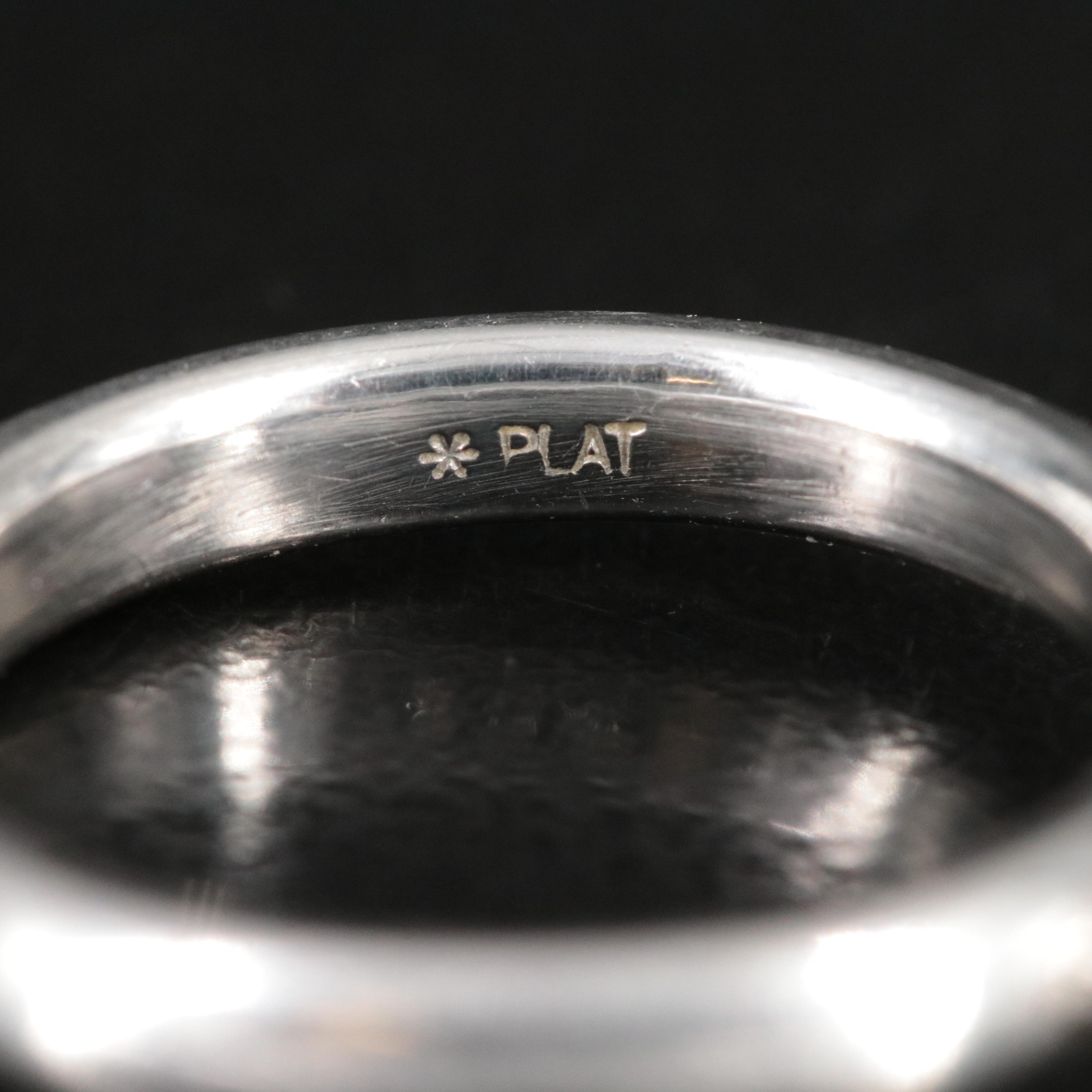 Platinum Solitaire Ring with 10K Bezel