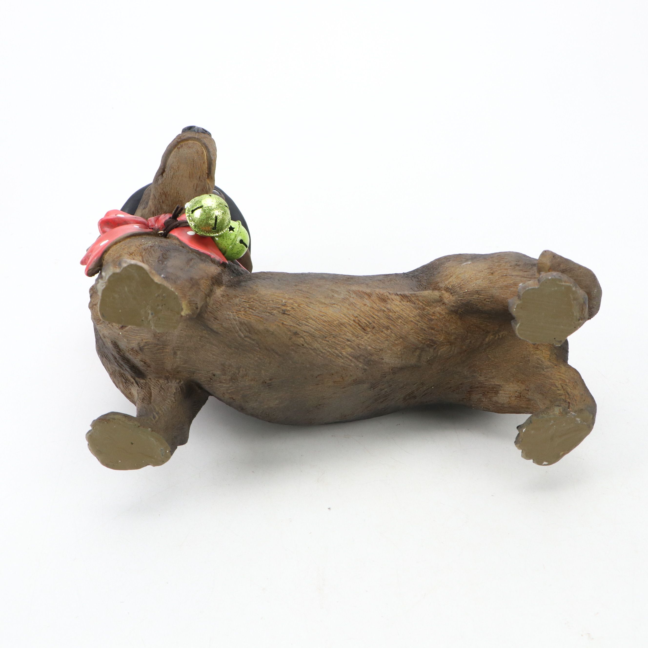 Christmas Dressed and Other Dog Figurines with Books and Other Décor