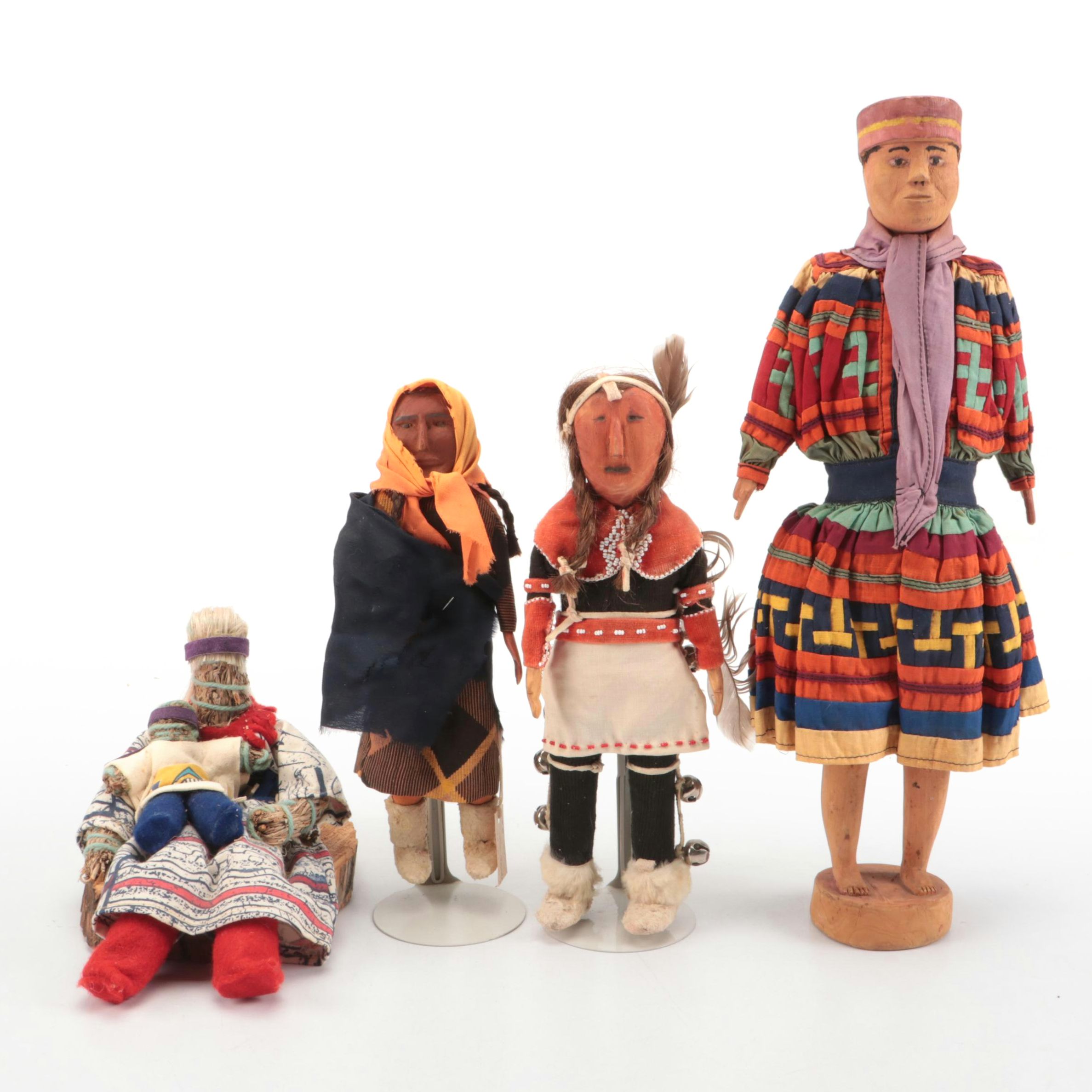 Chippewa and Seminole Carved Wood Dolls with Other Indigenous Dolls