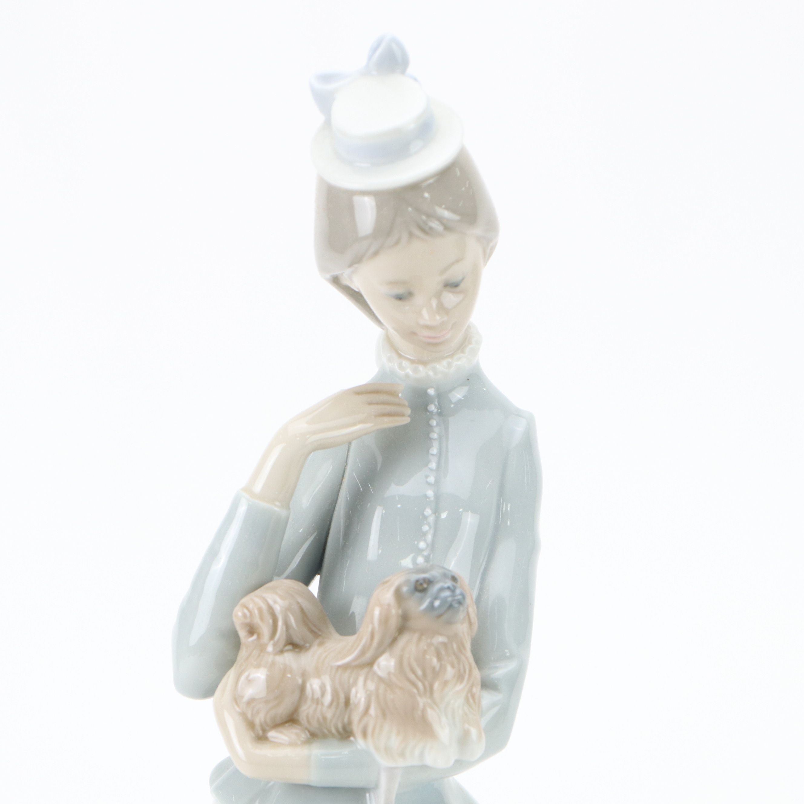 Lladró "A Walk with the Dog" Porcelain Figurine