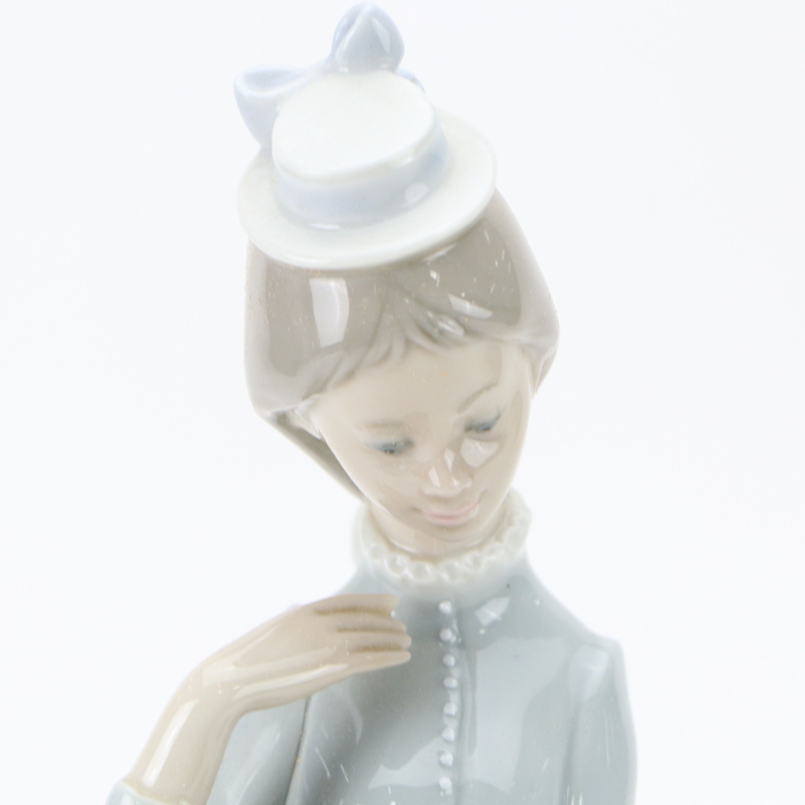 Lladró "A Walk with the Dog" Porcelain Figurine