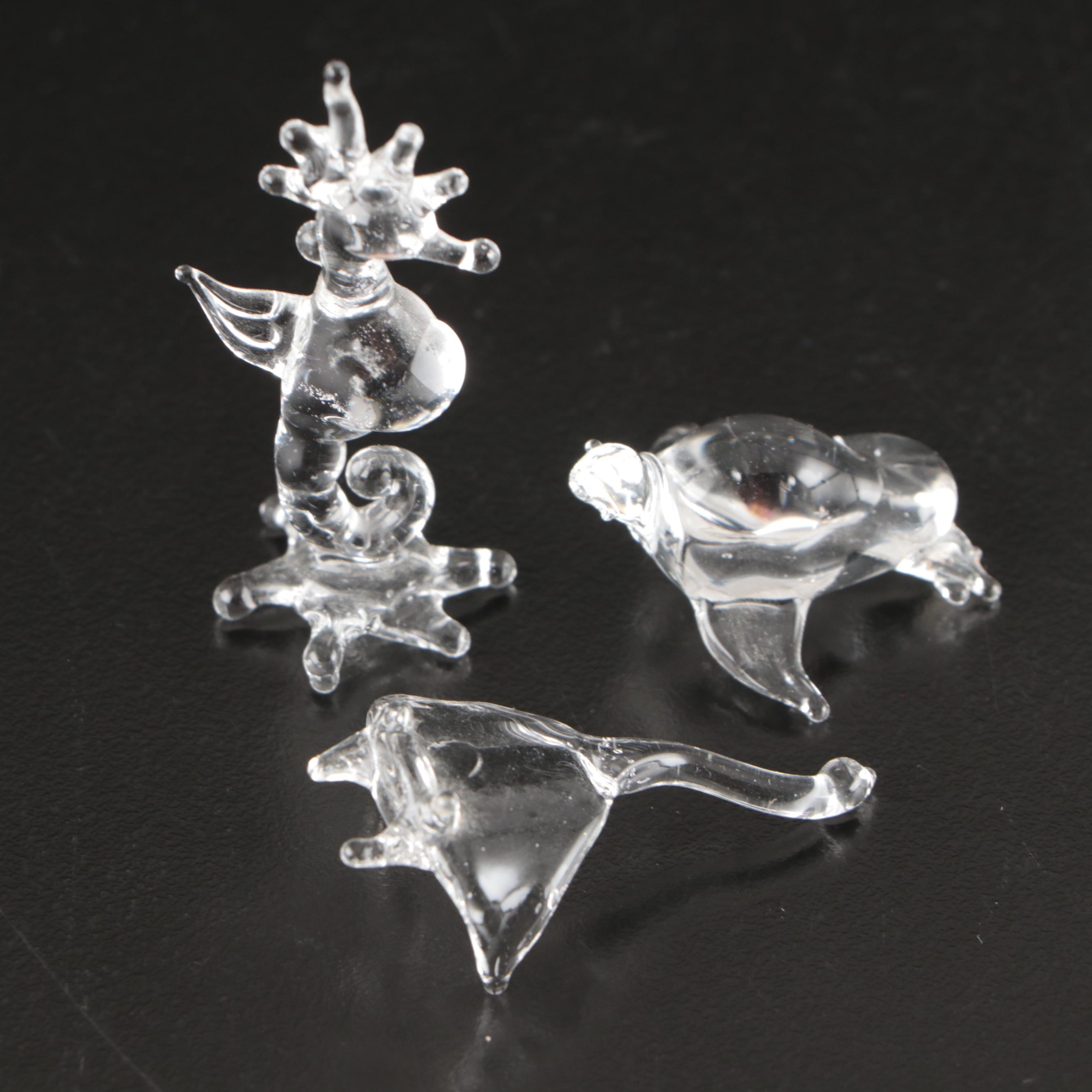 Carved Wood and Glass Animal Figurines