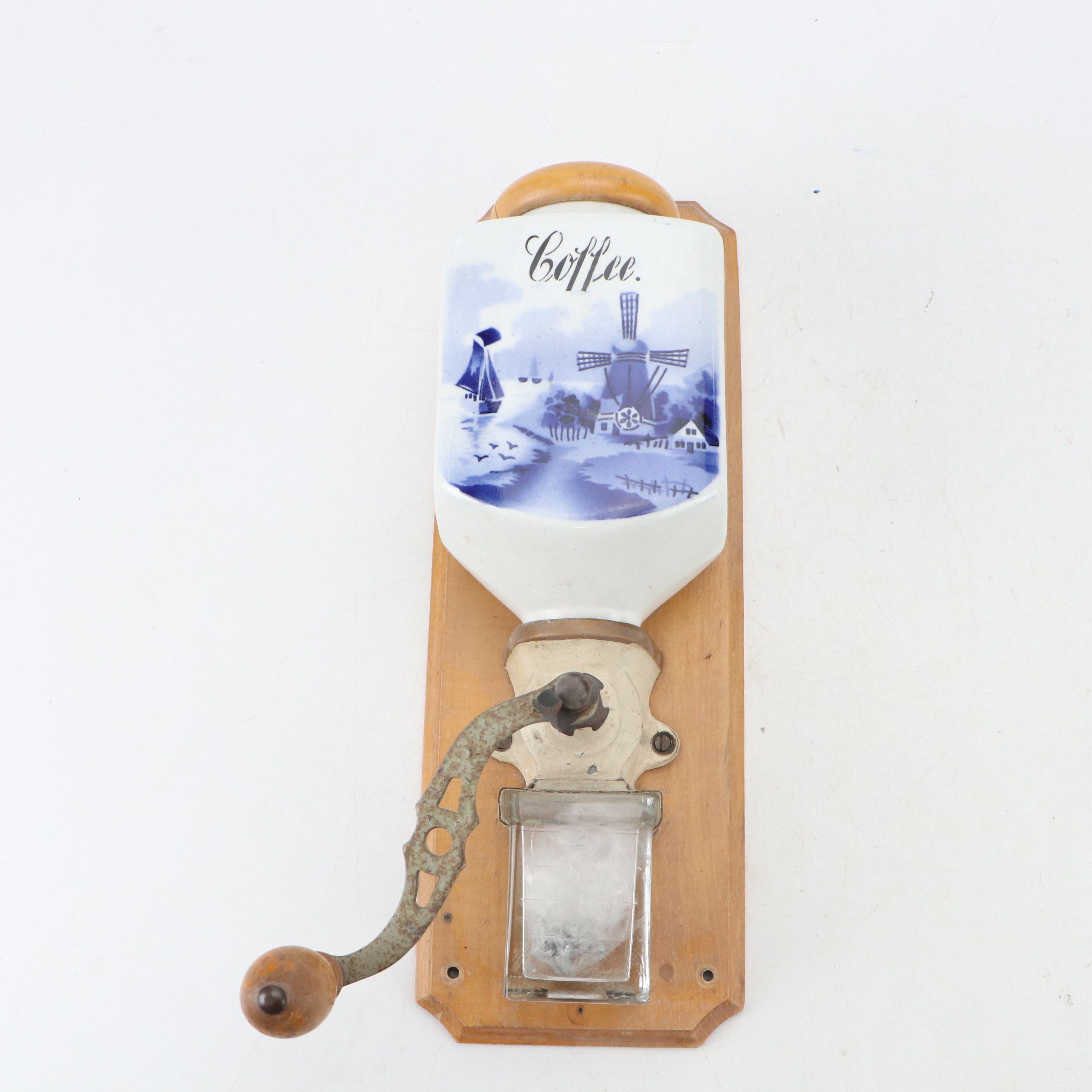 De Delftse Pauw Candlesticks with Other Wall Mounted Coffee Grinder and Vase