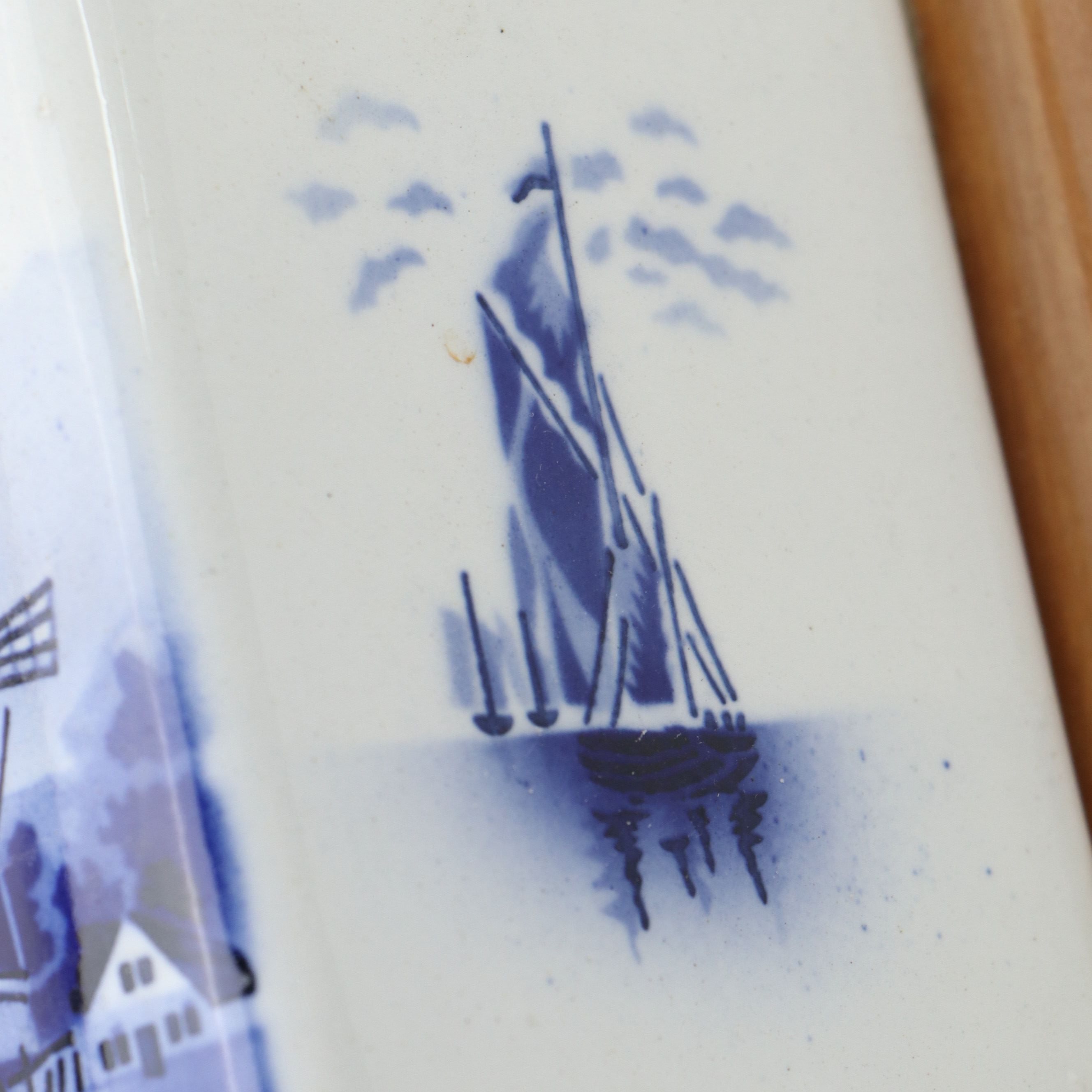 De Delftse Pauw Candlesticks with Other Wall Mounted Coffee Grinder and Vase