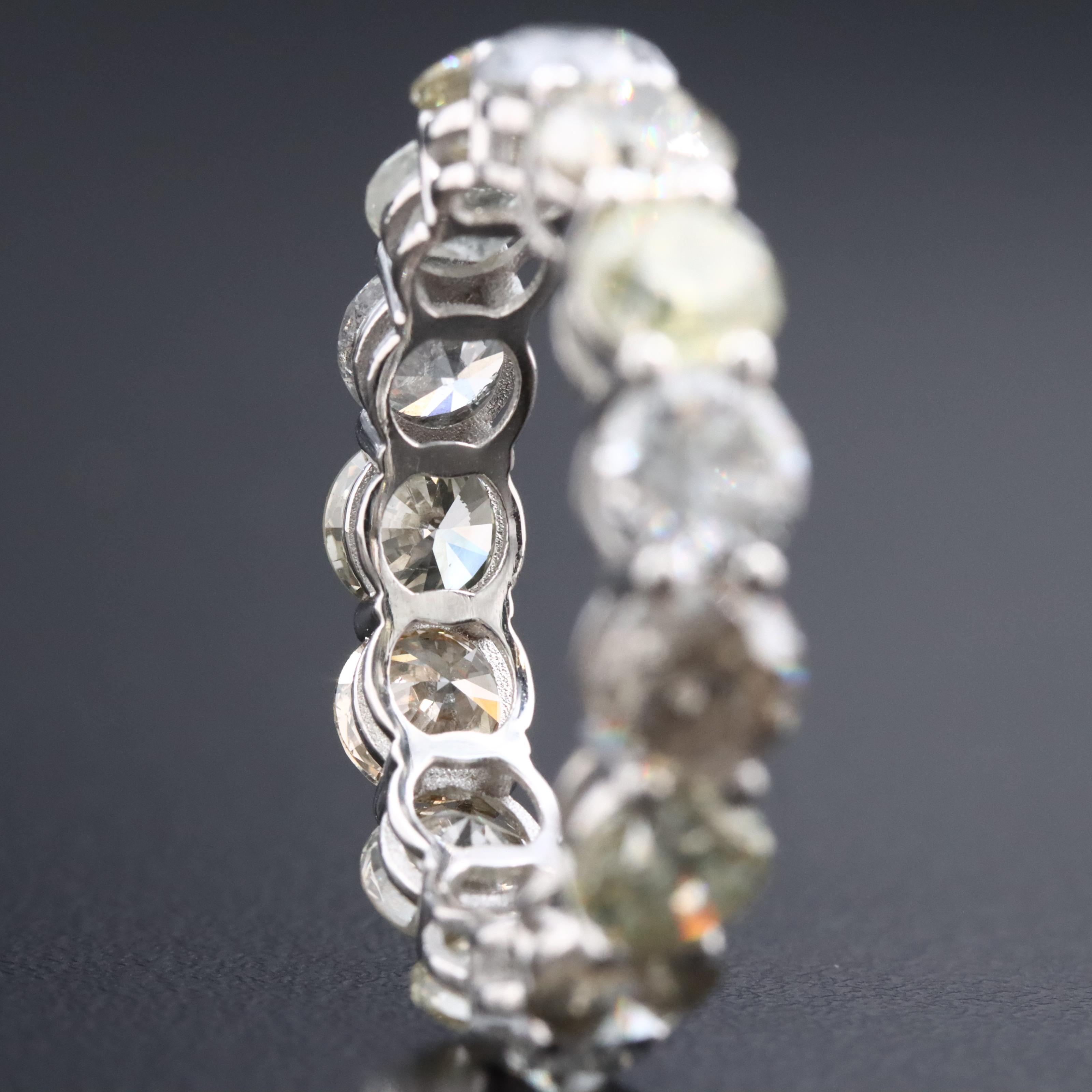 14K 7.63 CTW Diamond Eternity Band with IGI Report and Fancy Color Diamonds