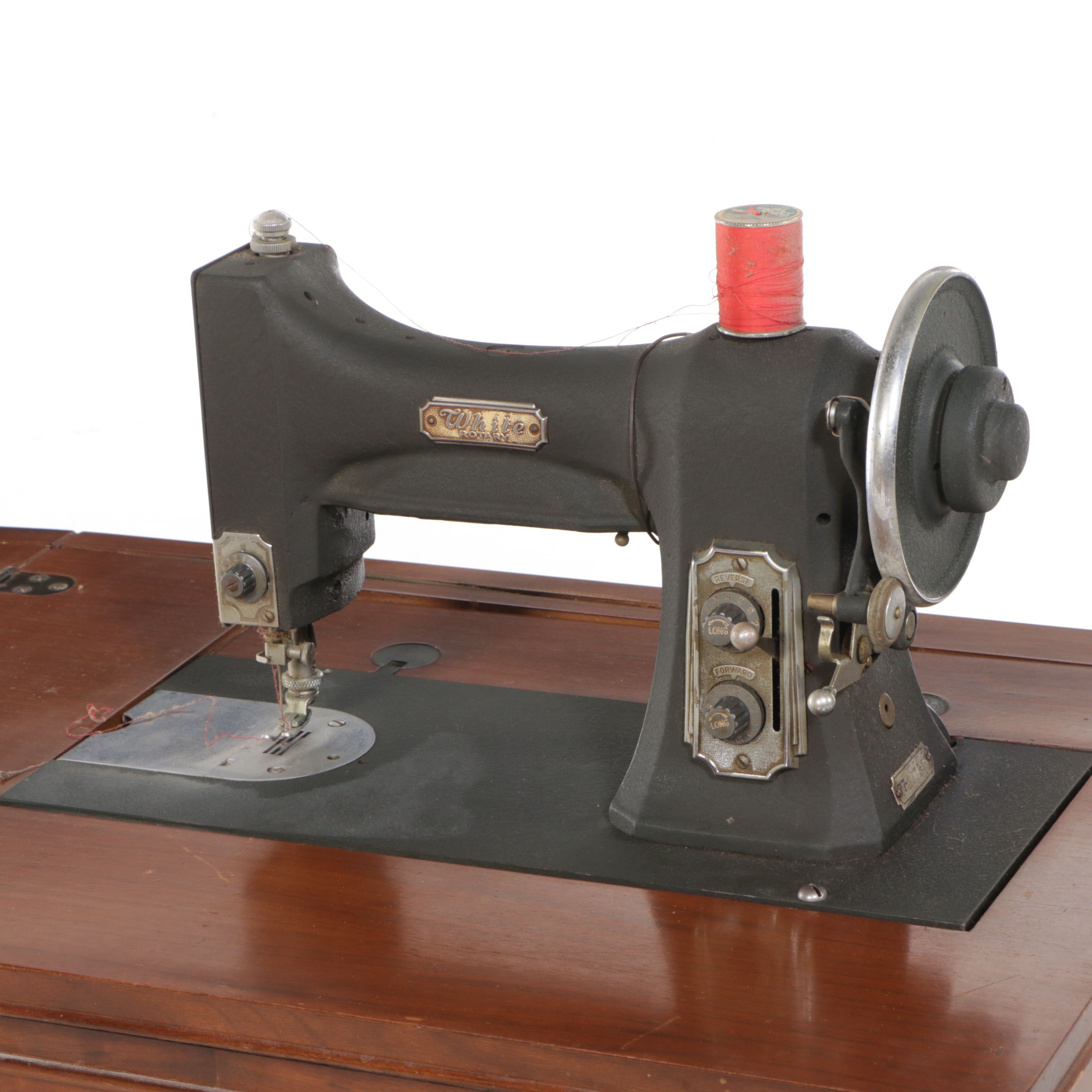 White Sewing Machine and Mahogany Veneer Sewing Machine Table