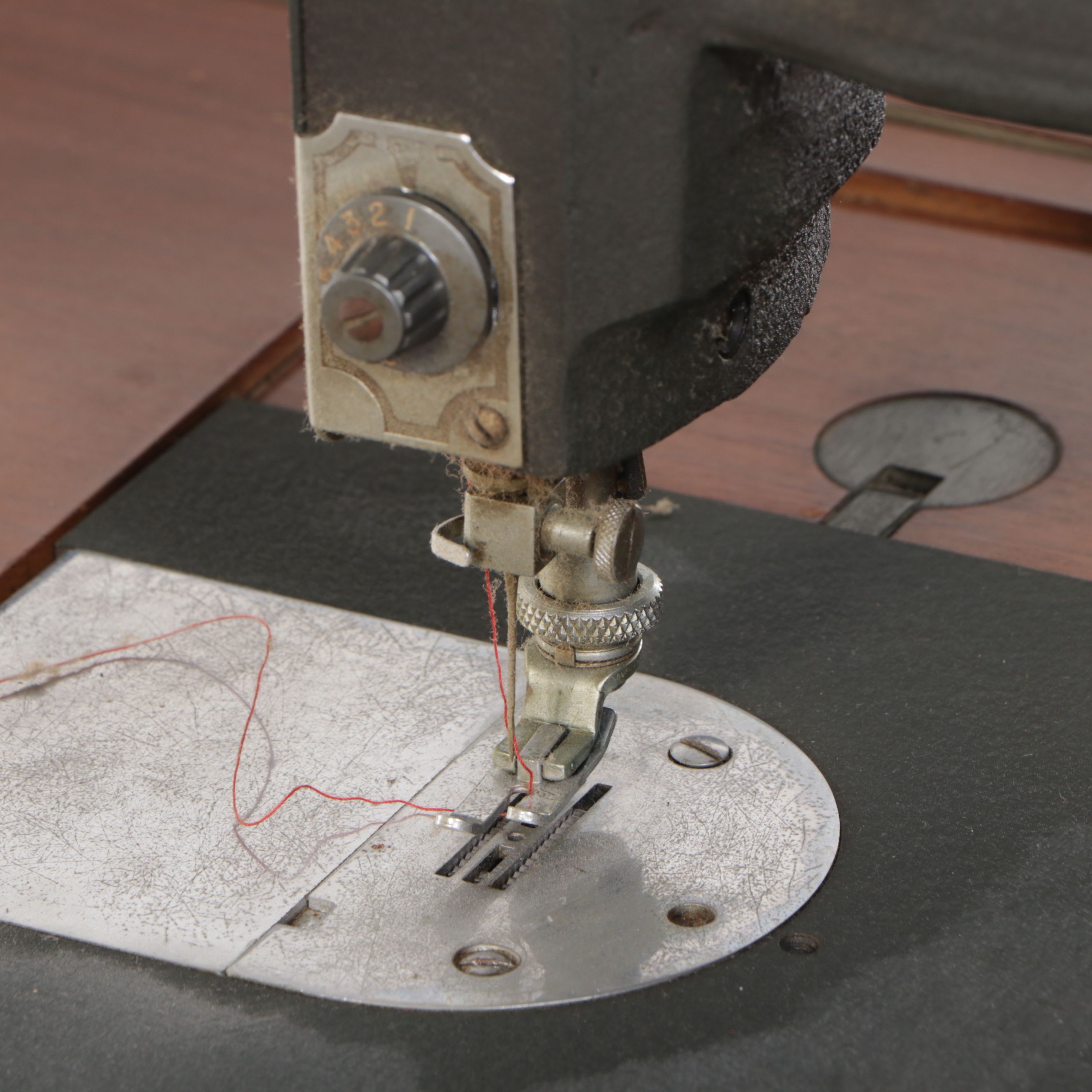 White Sewing Machine and Mahogany Veneer Sewing Machine Table
