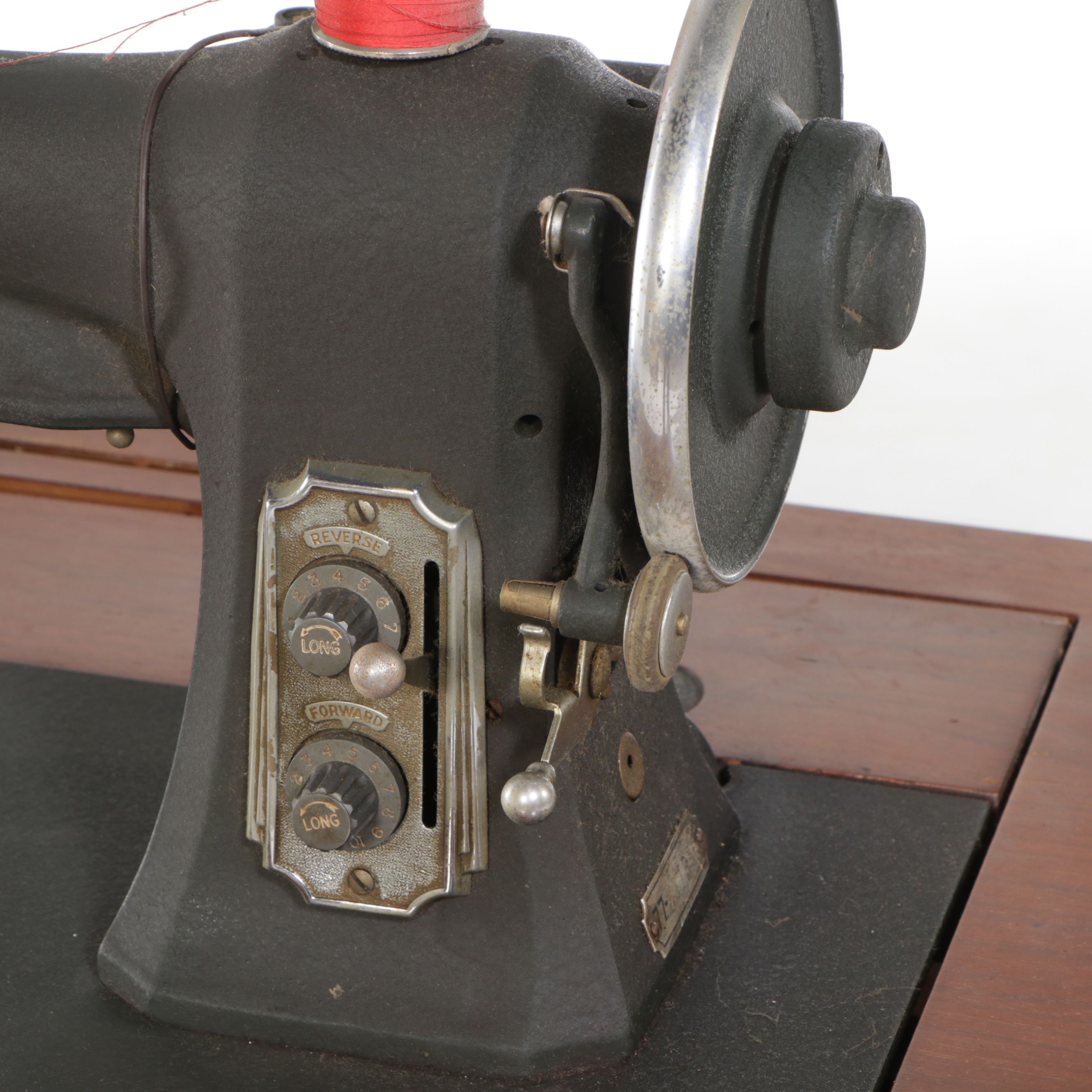 White Sewing Machine and Mahogany Veneer Sewing Machine Table