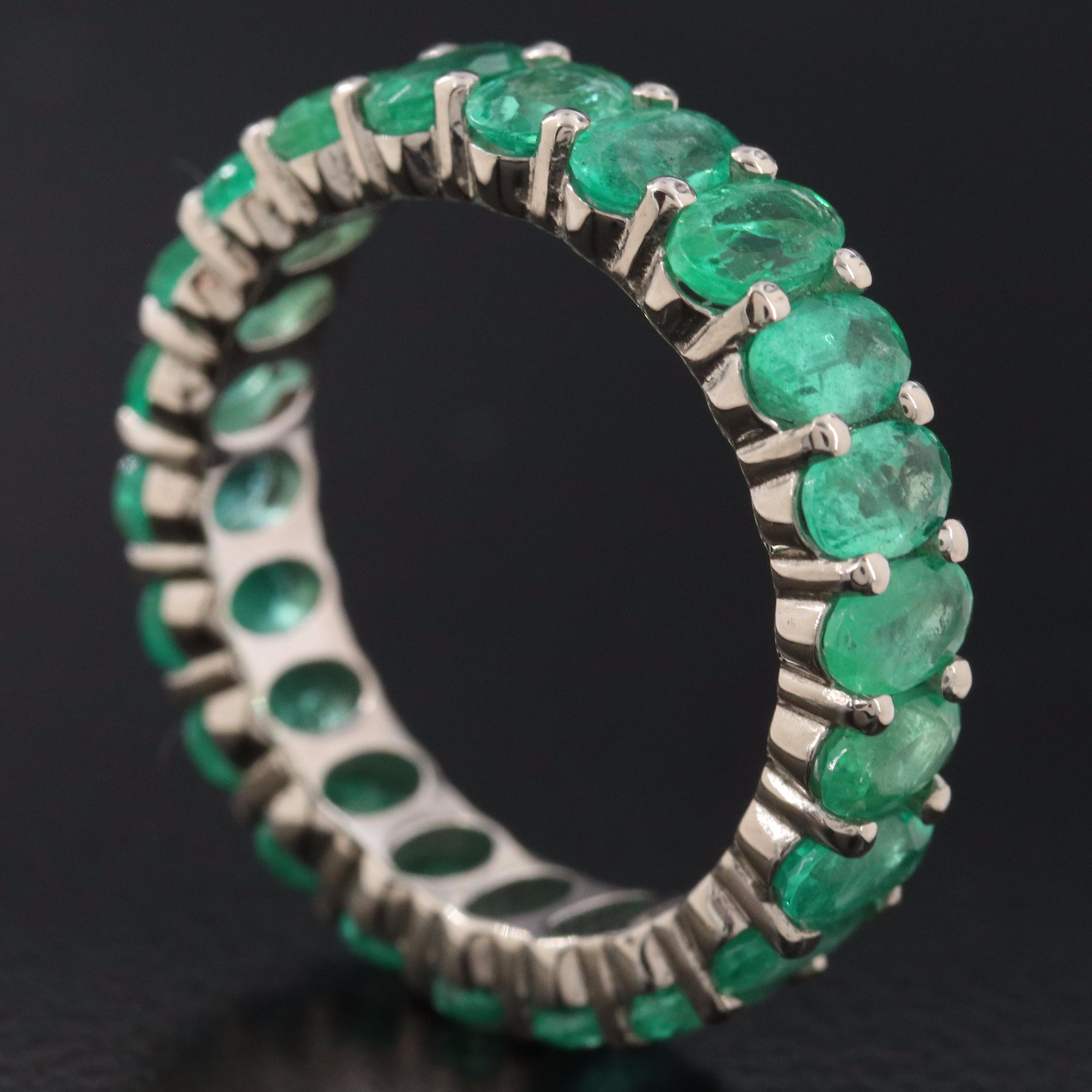 14K 4.86 CTW Emerald Eternity Band with IGI Report