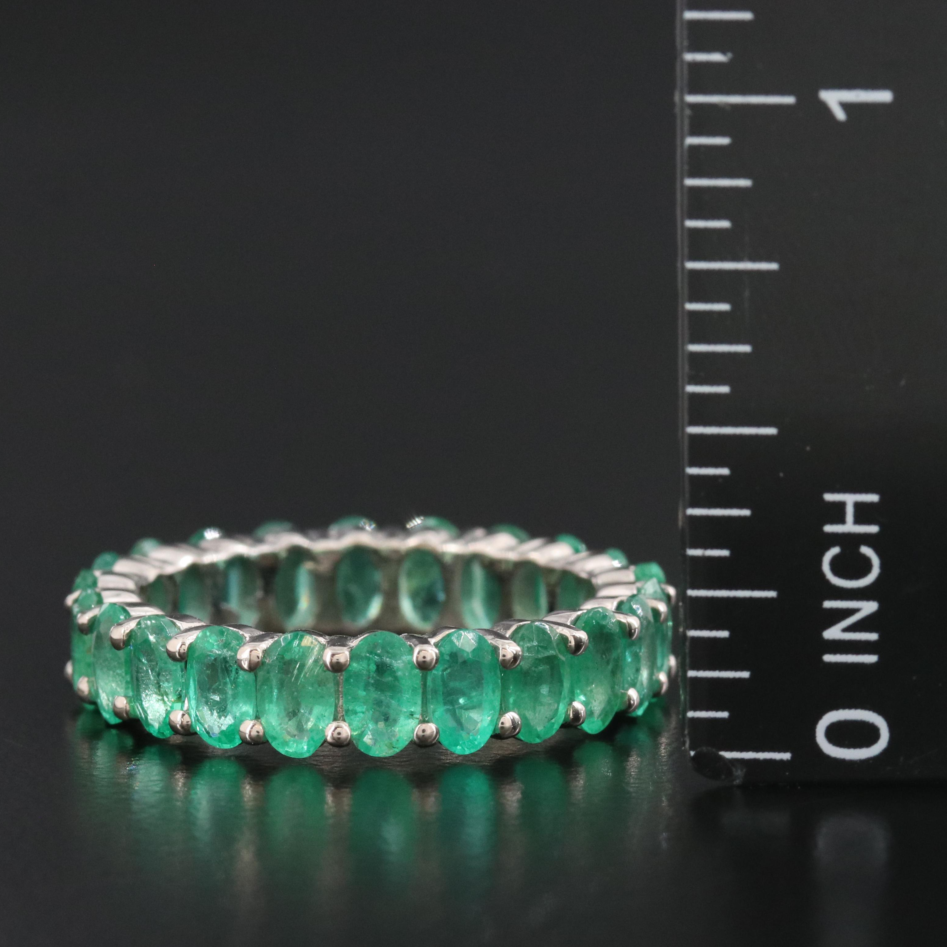 14K 4.86 CTW Emerald Eternity Band with IGI Report