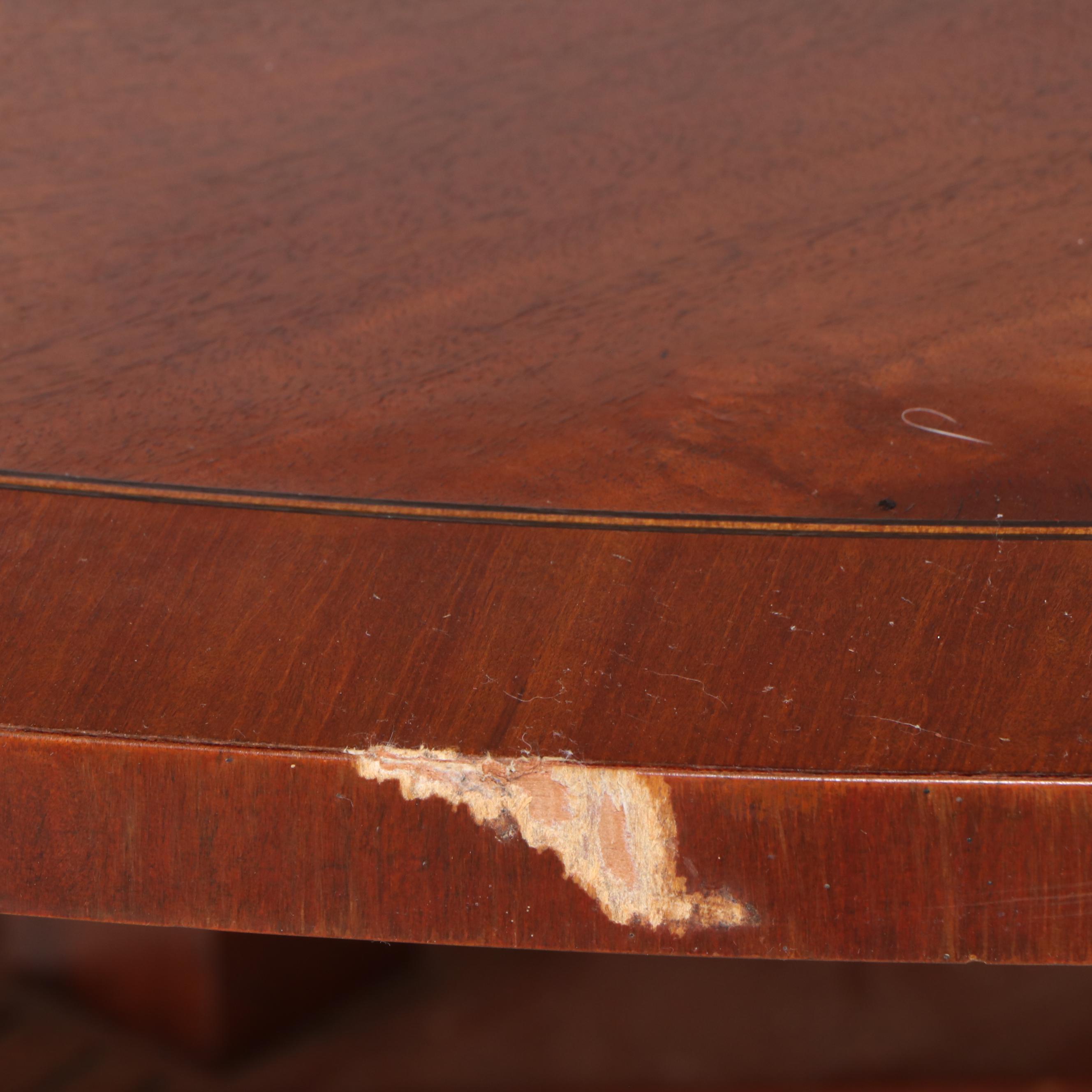 Regency Style Mahogany and Burl Pedestal Table with Brass Paw Feet and Casters