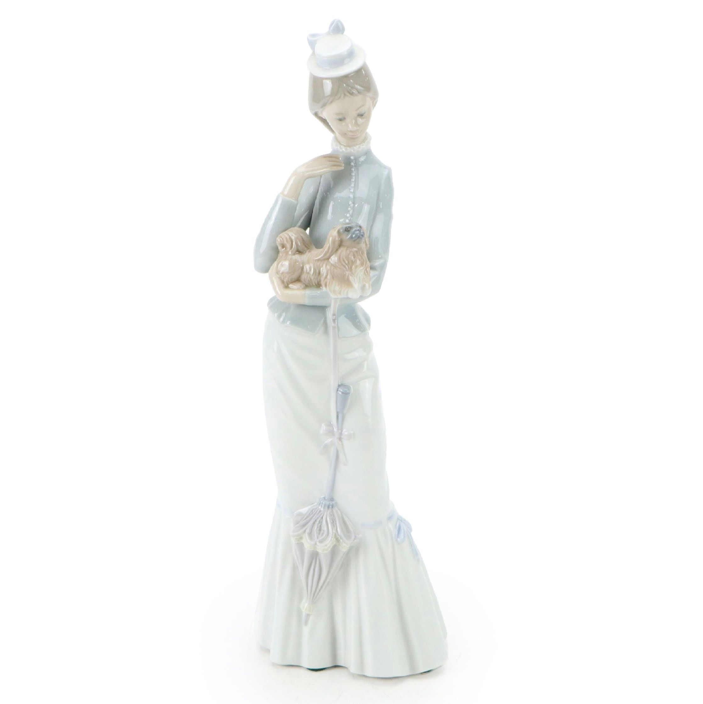 Lladró "A Walk with the Dog" Porcelain Figurine