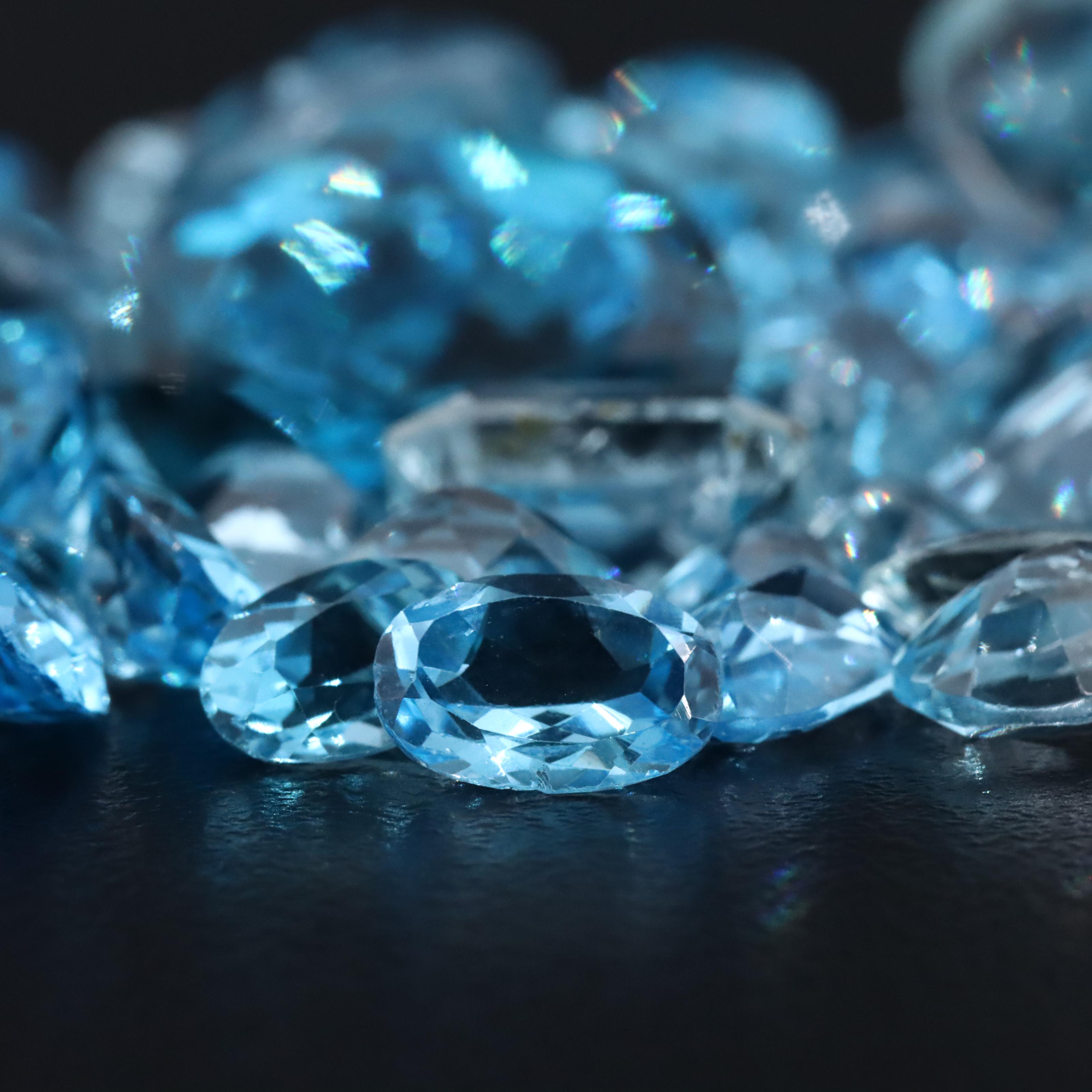 Loose 78.01 CTW Topaz and Aquamarine Collection