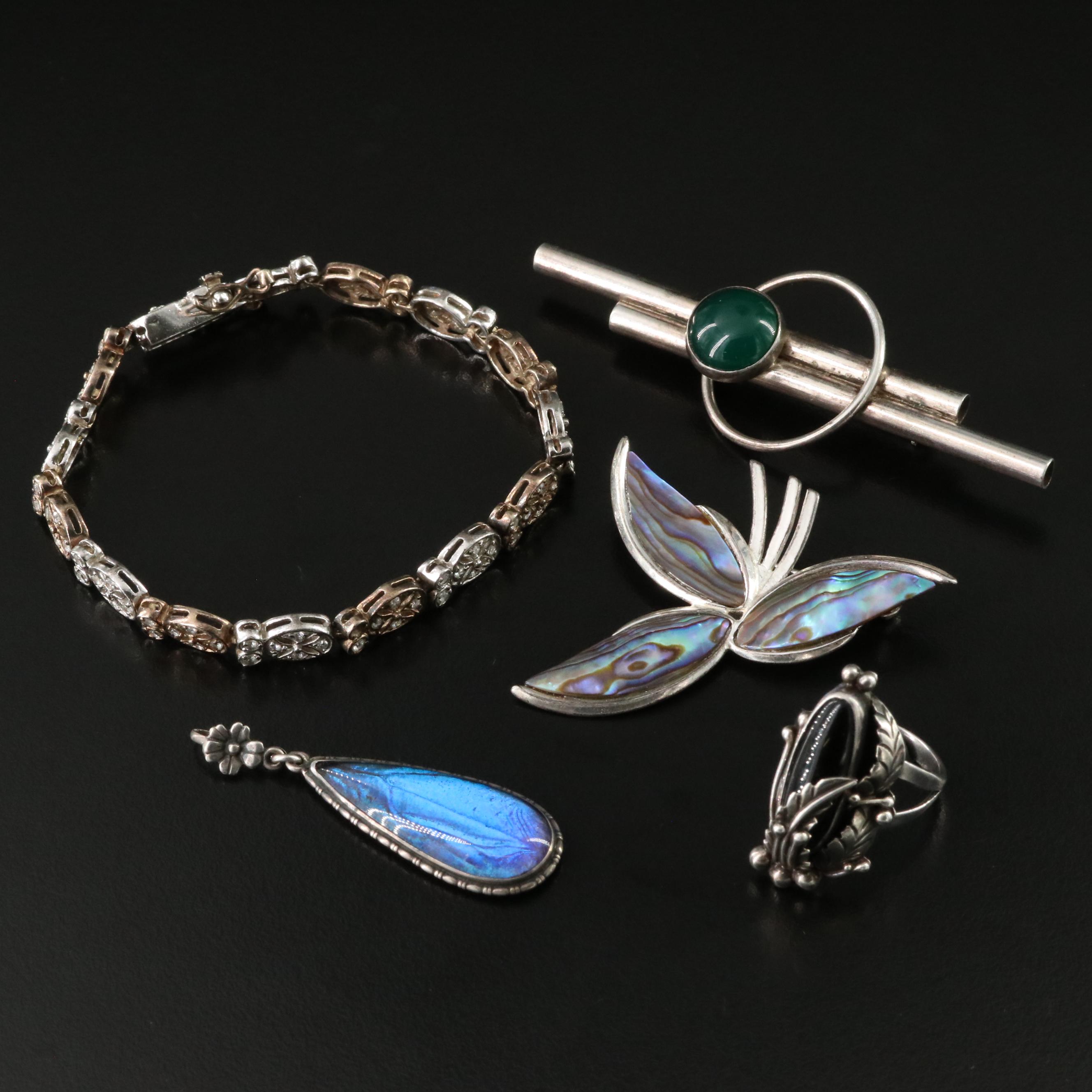Abalone, Morpho Butterfly Wing and Chalcedony Featured in Sterling Jewelry