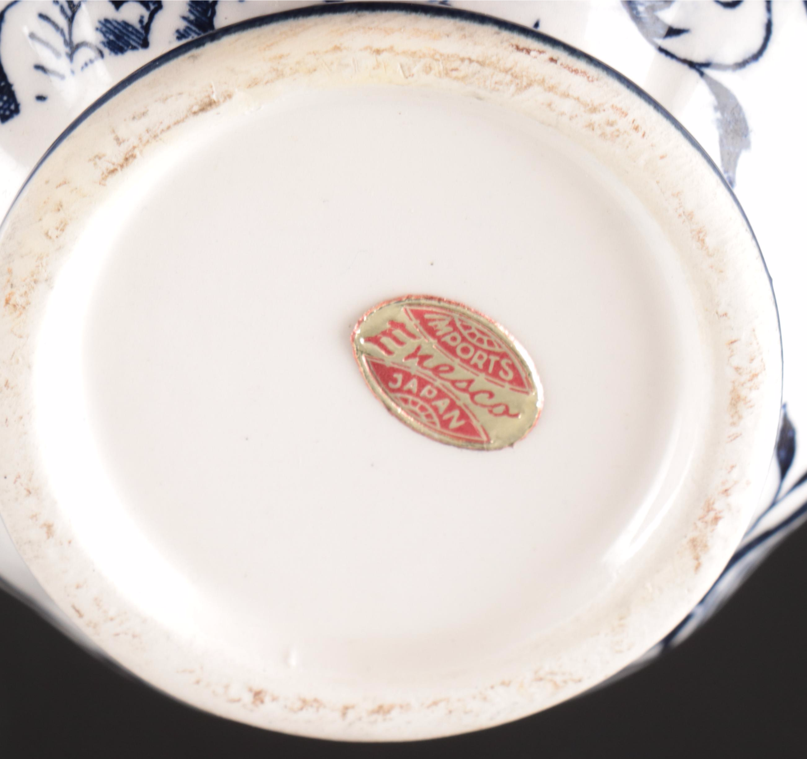 Japanese Blue Floral Ceramic Pitcher and Plates with Other Floral Tableware