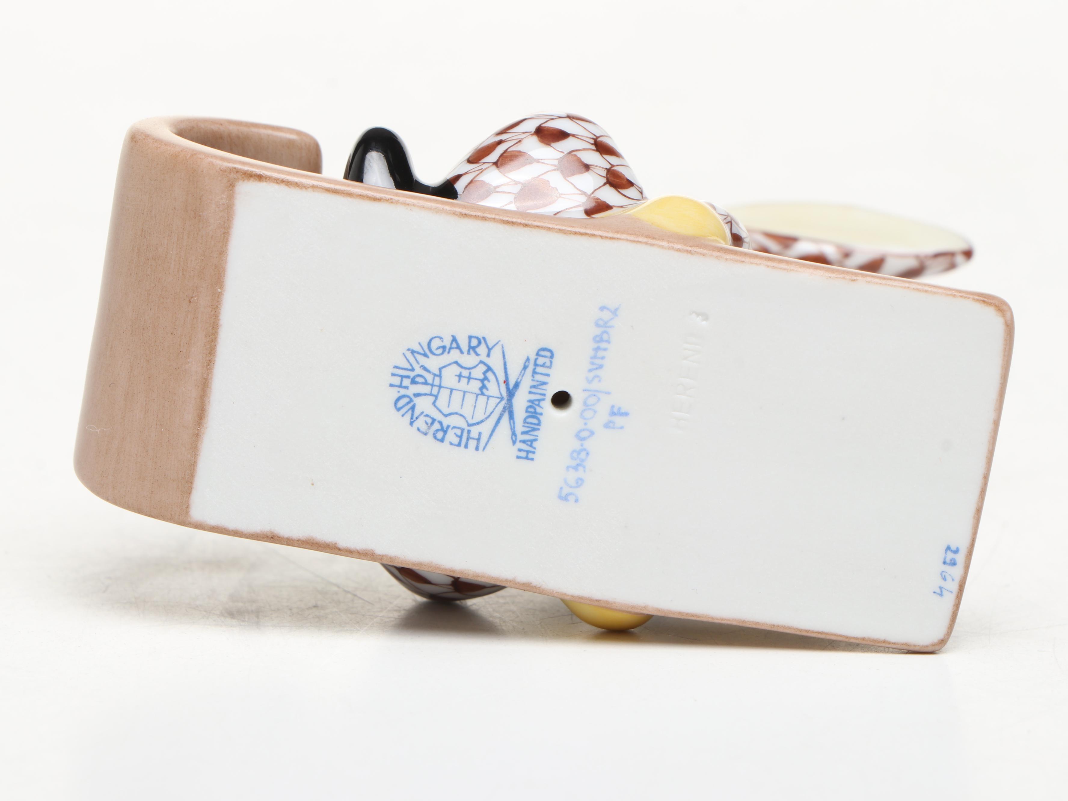 Herend Chocolate Fishnet and Gilt Accented "Sledding Bunny" Porcelain Figurine