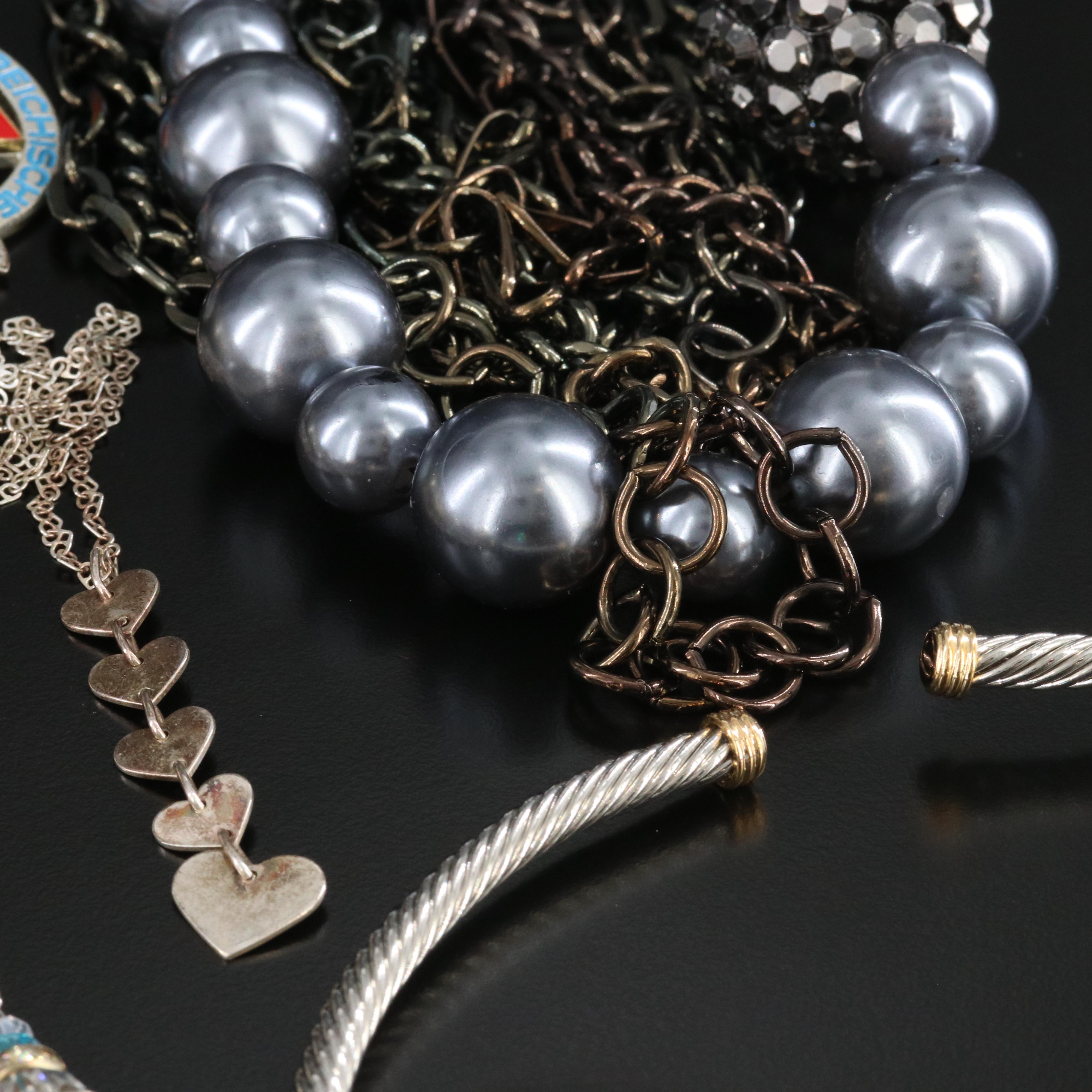 Egyptian Revival Earrings Featured in Jewelry Collection