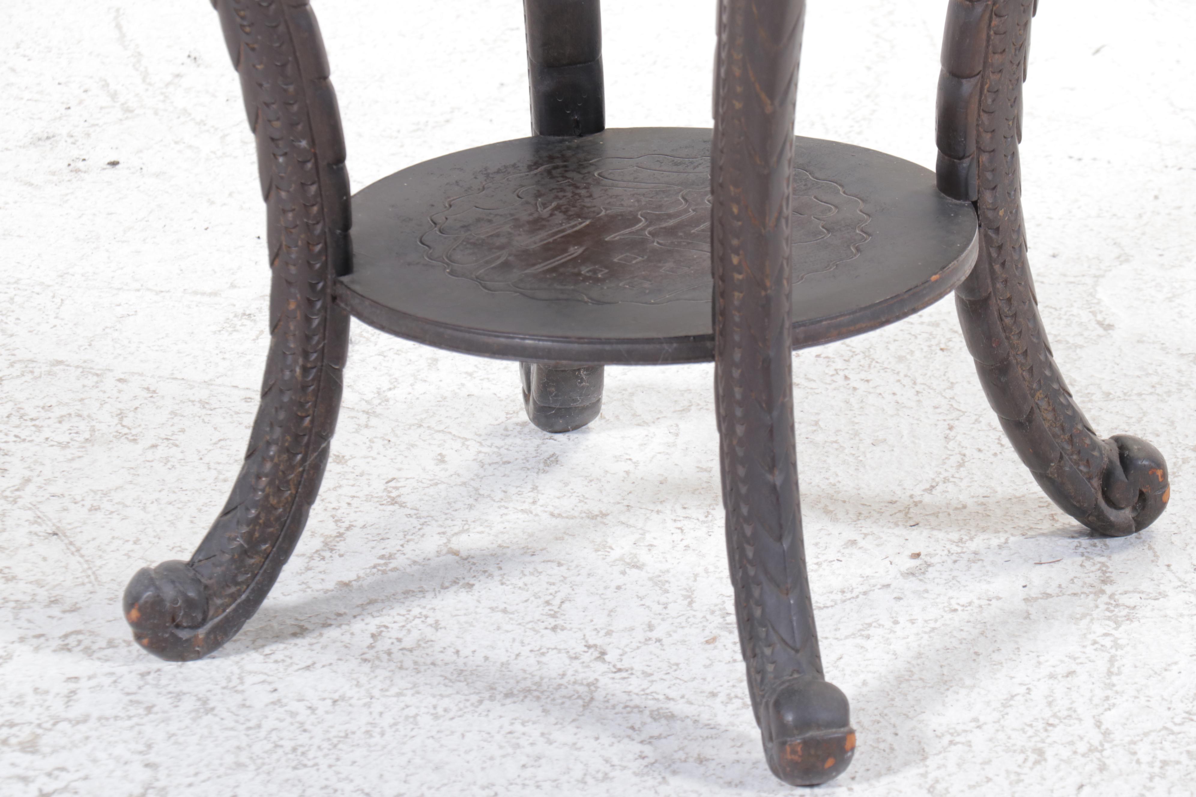 Chinese Ornately Carved Ebonized Wood Stand